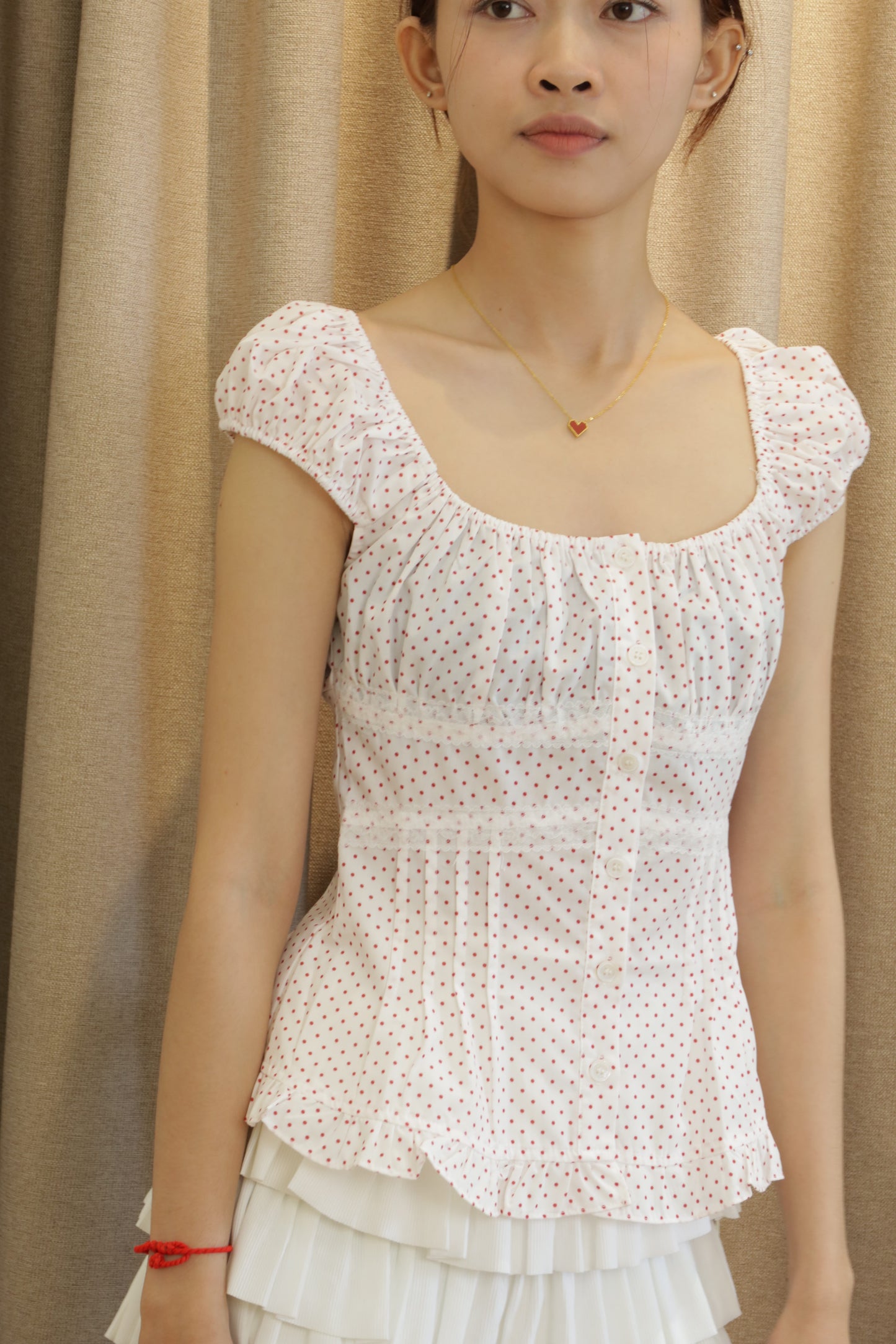 Red polkadot white top