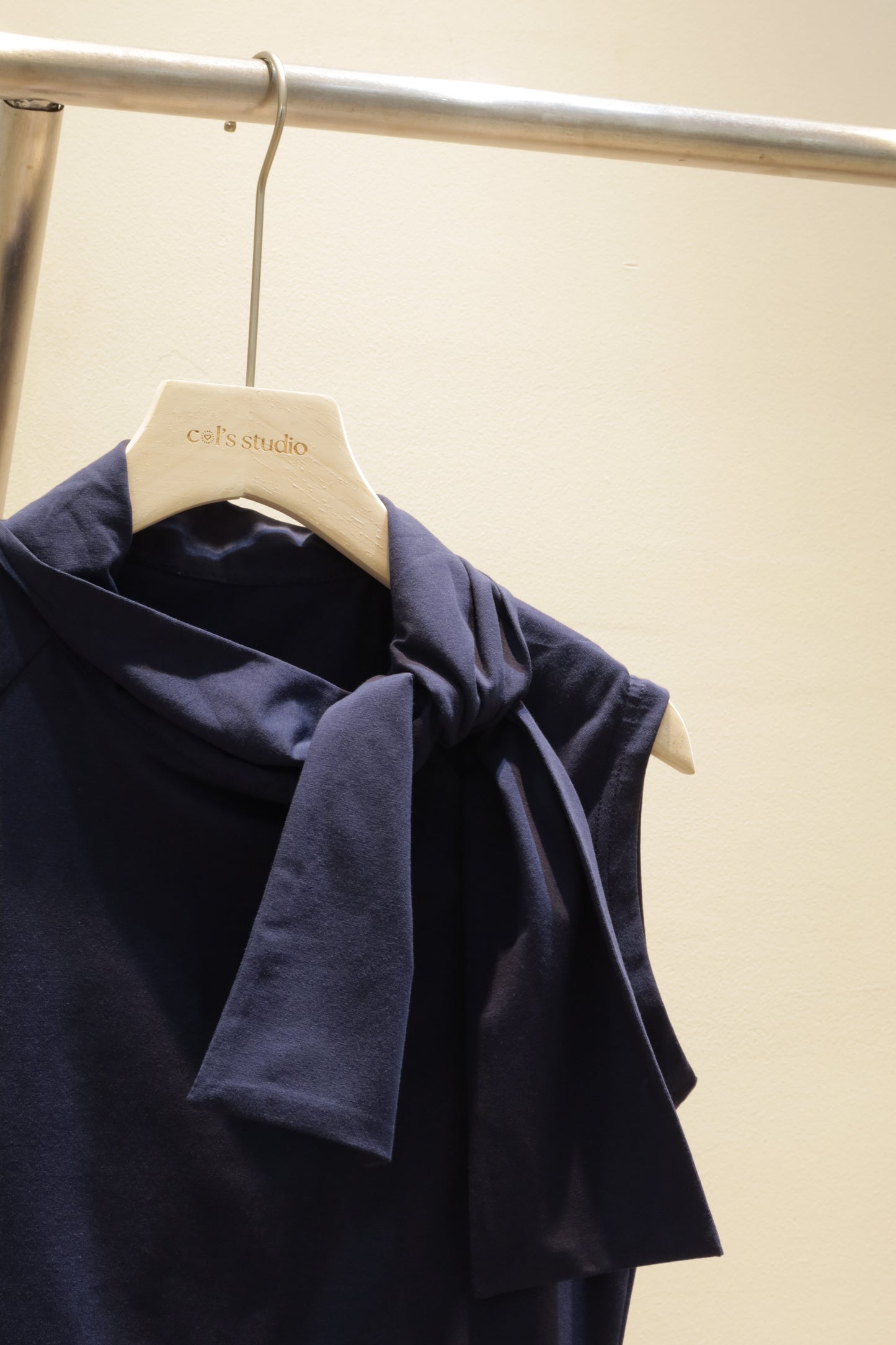 Navy sleeveless bow top