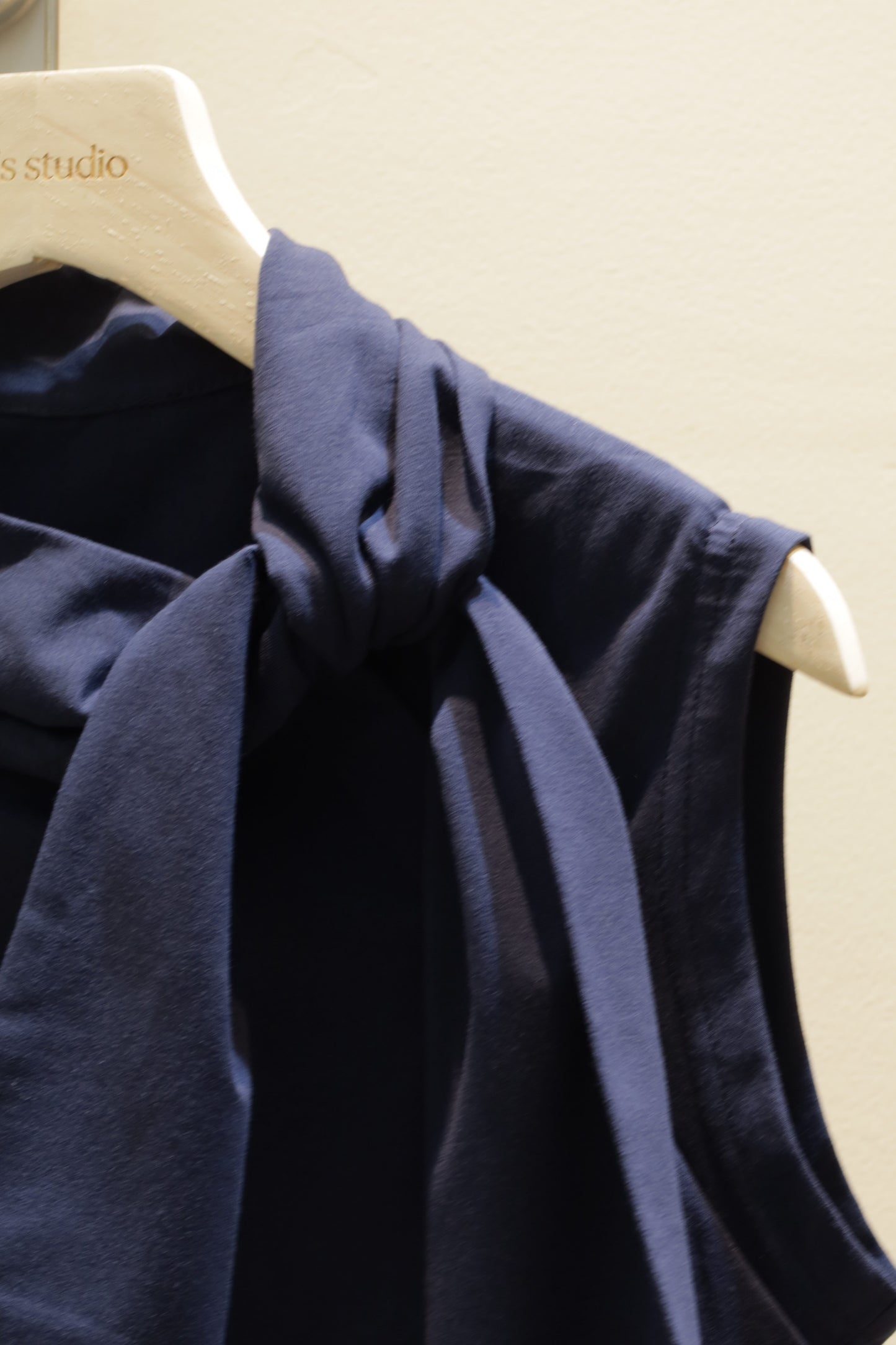 Navy sleeveless bow top