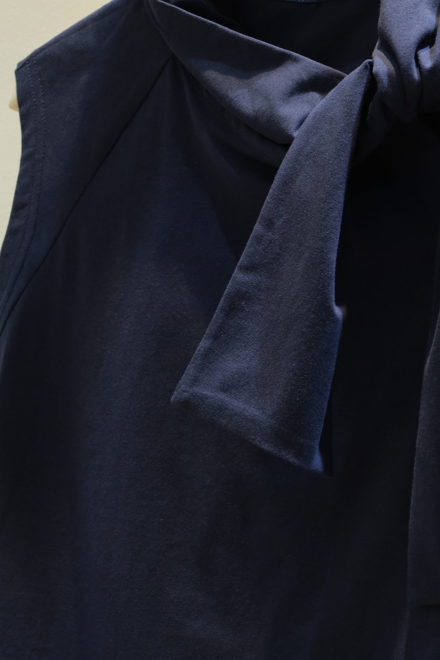 Navy sleeveless bow top