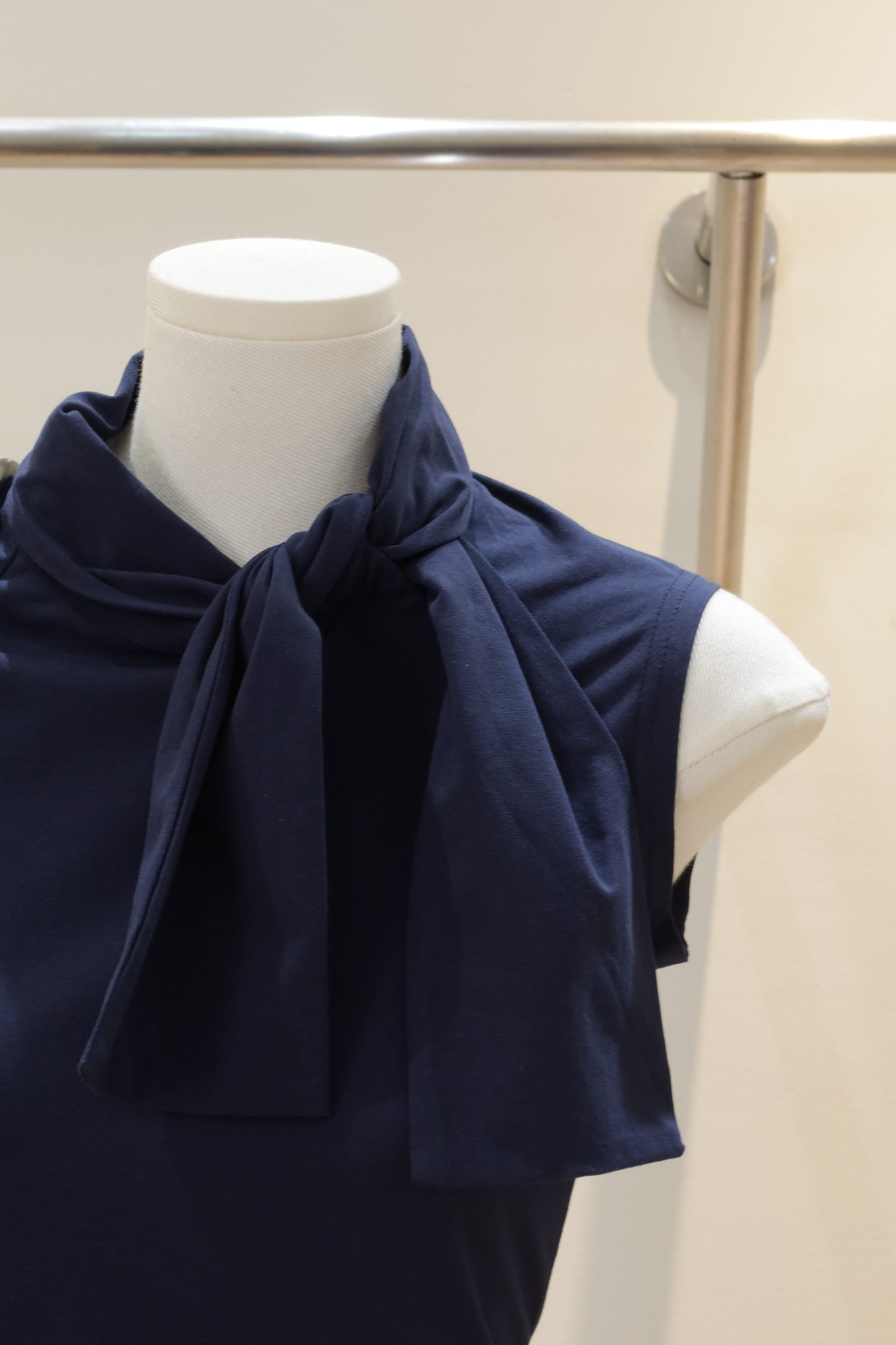 Navy sleeveless bow top