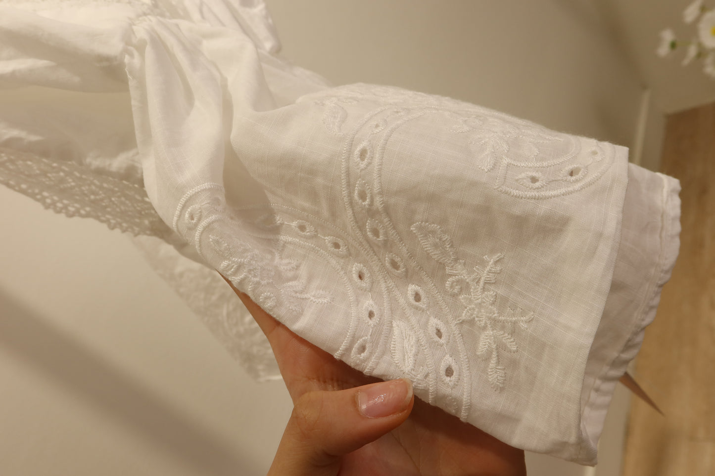 White deep cut flowy top