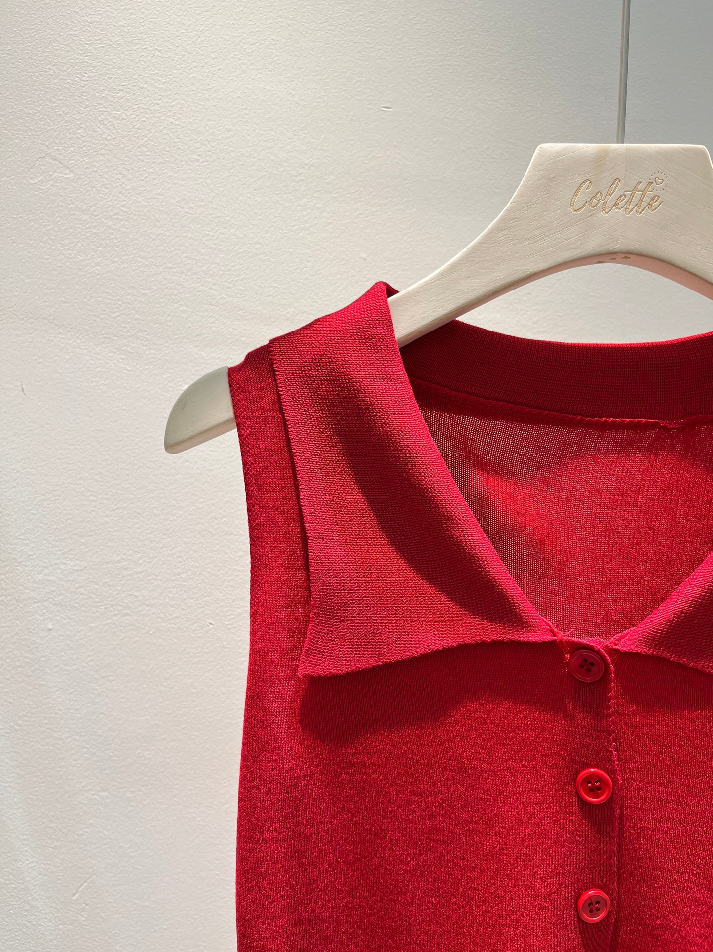 RED SLEEVELESS POLO TOP