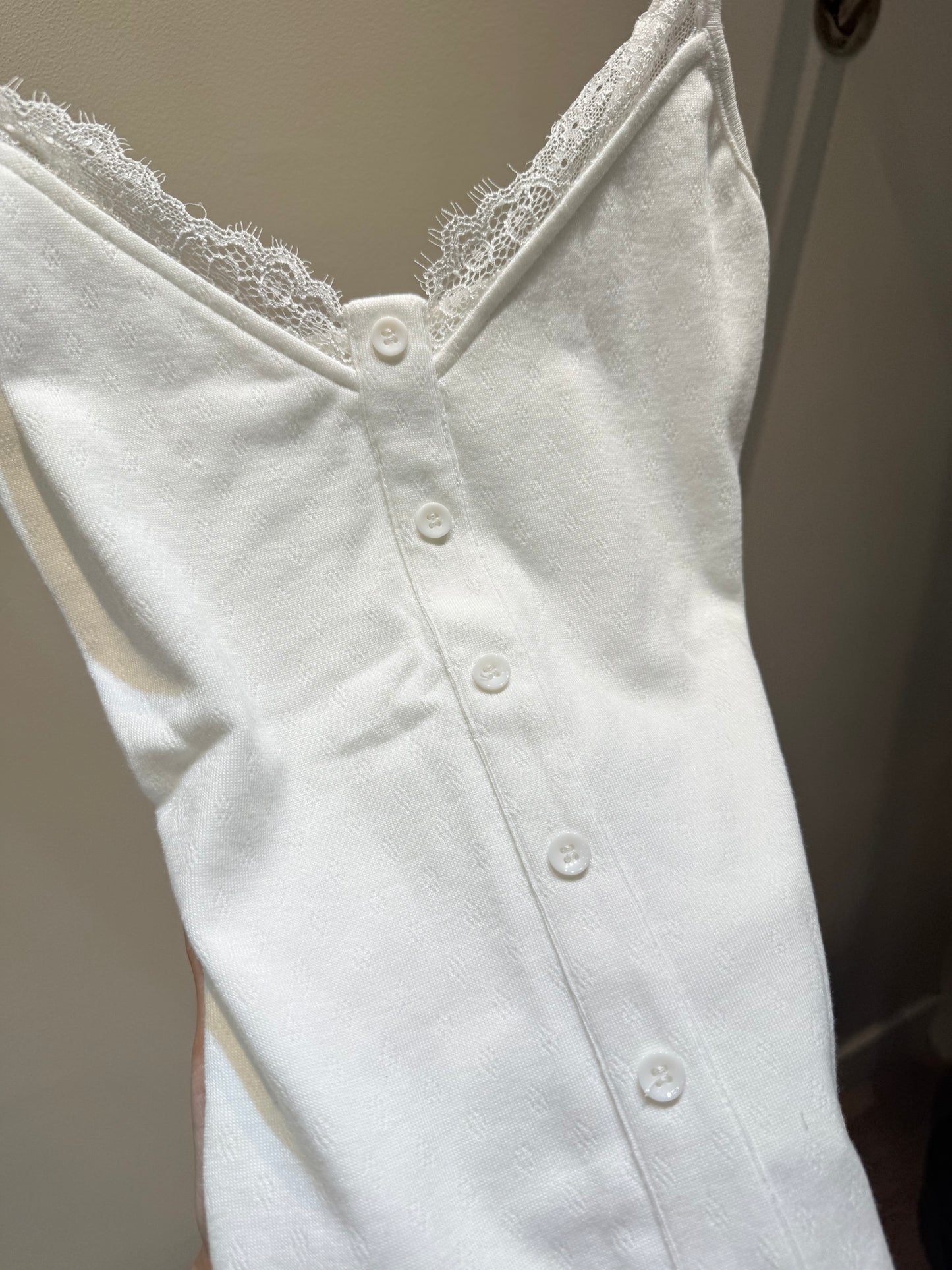 White buttons tank top
