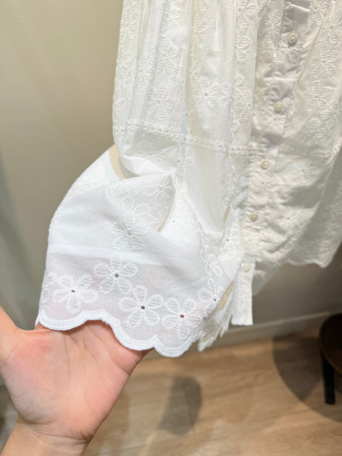 Eyelet flowy top