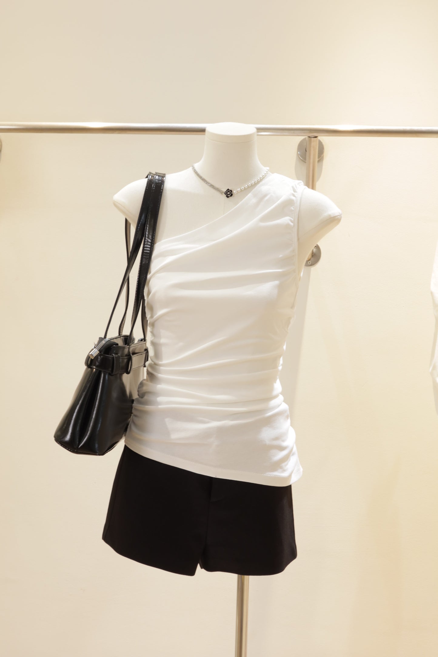 White waist cinch off shoulder