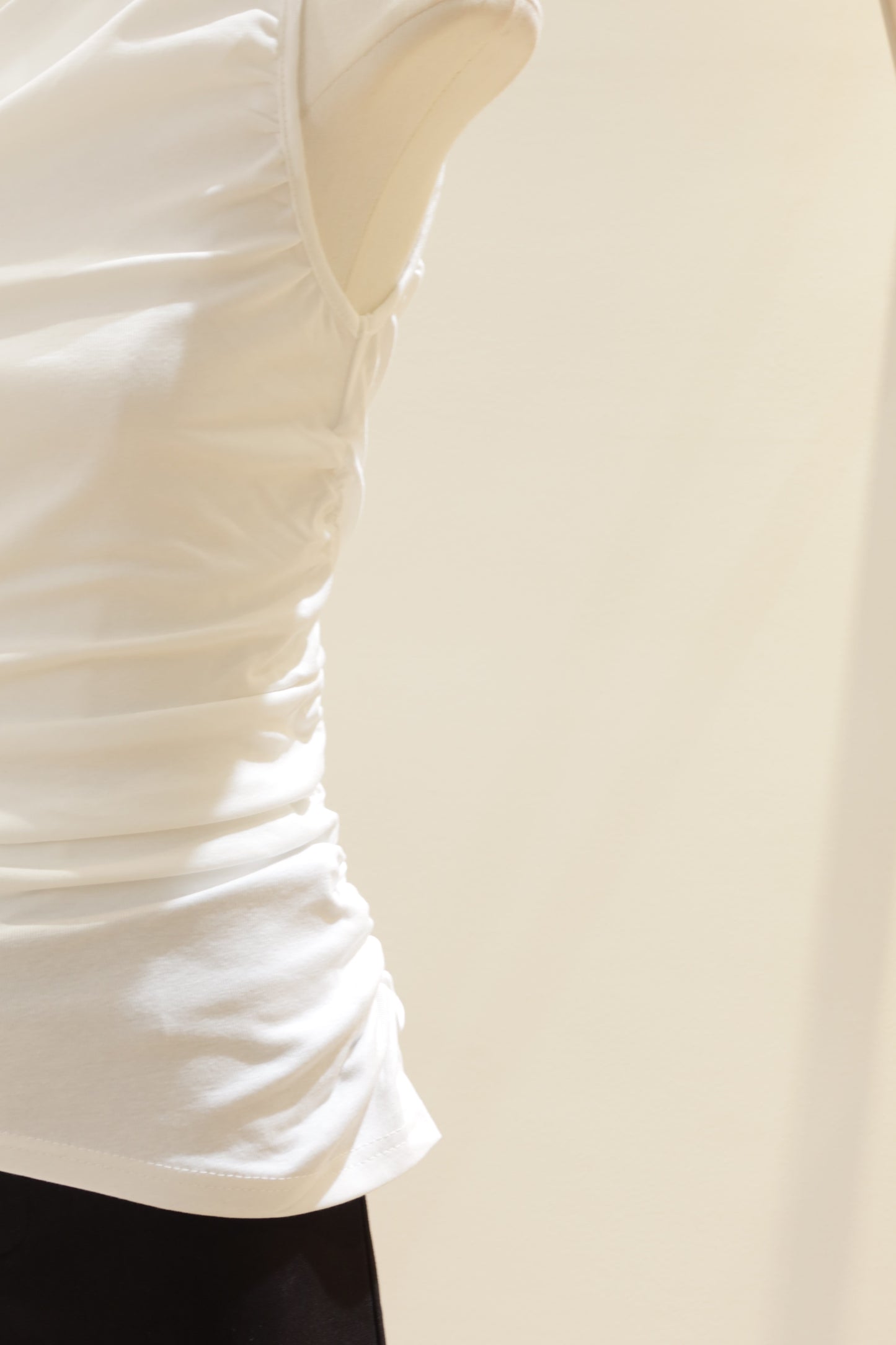 White waist cinch off shoulder