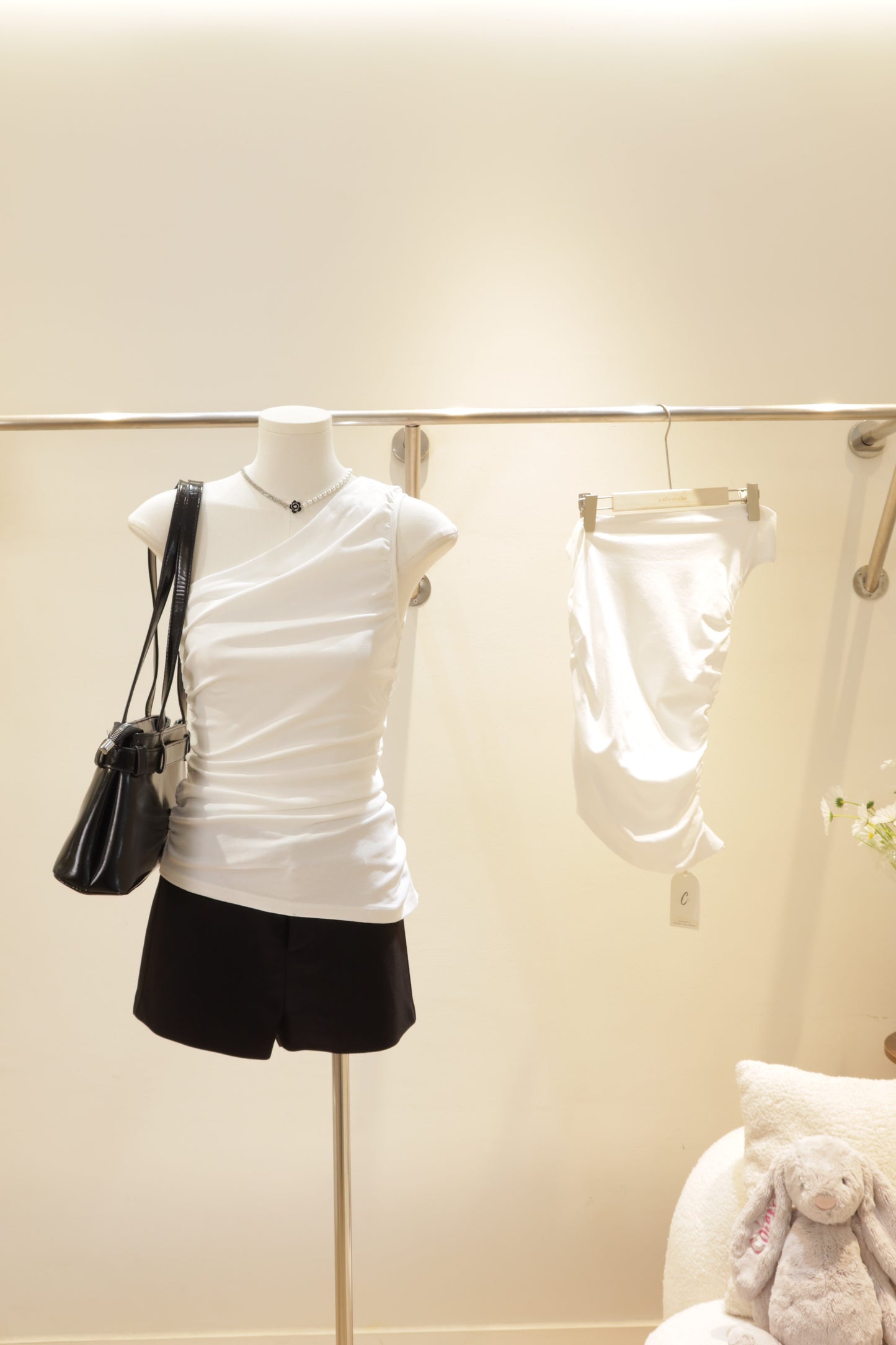 White waist cinch off shoulder