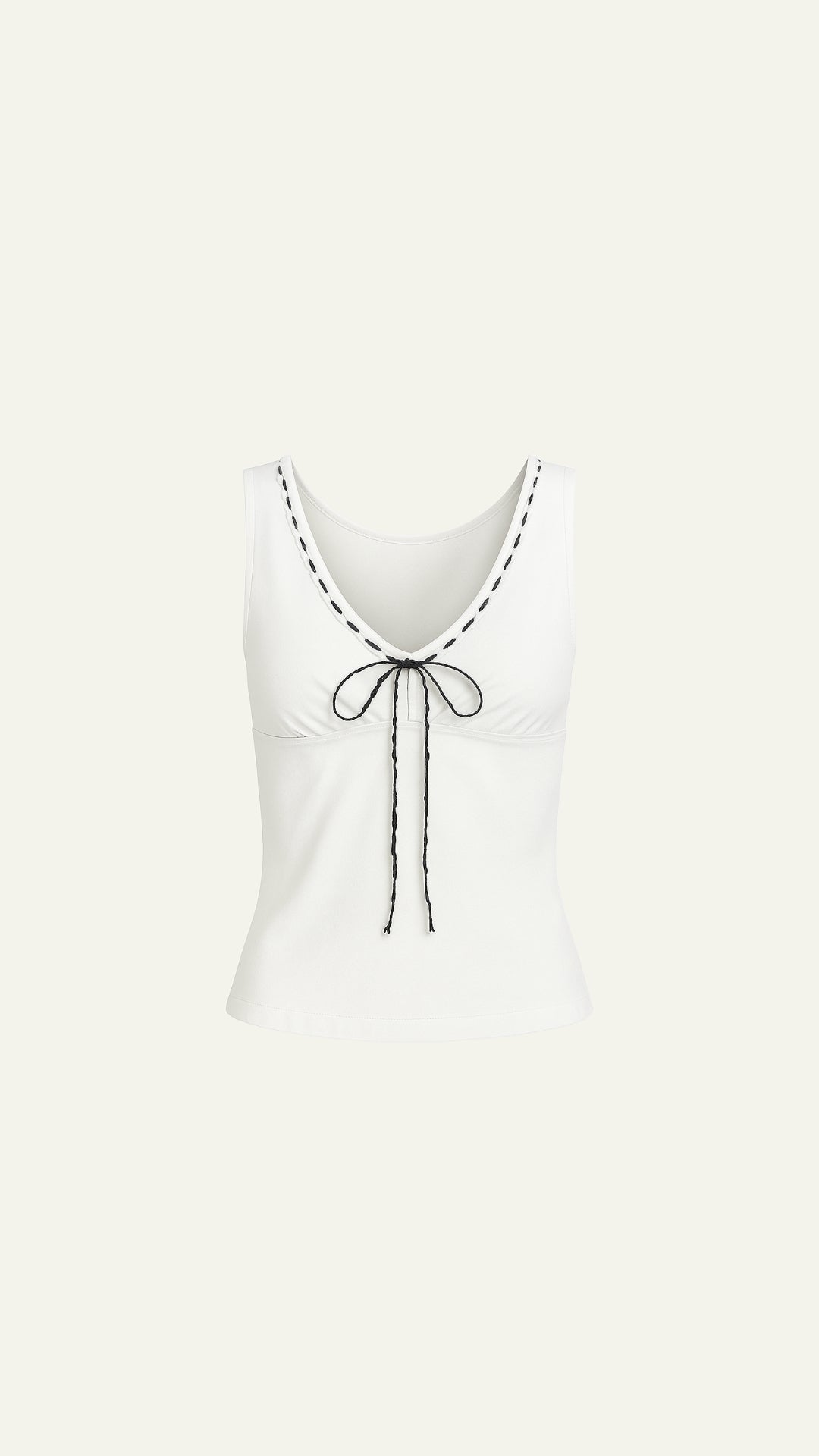 White top with black ribbon