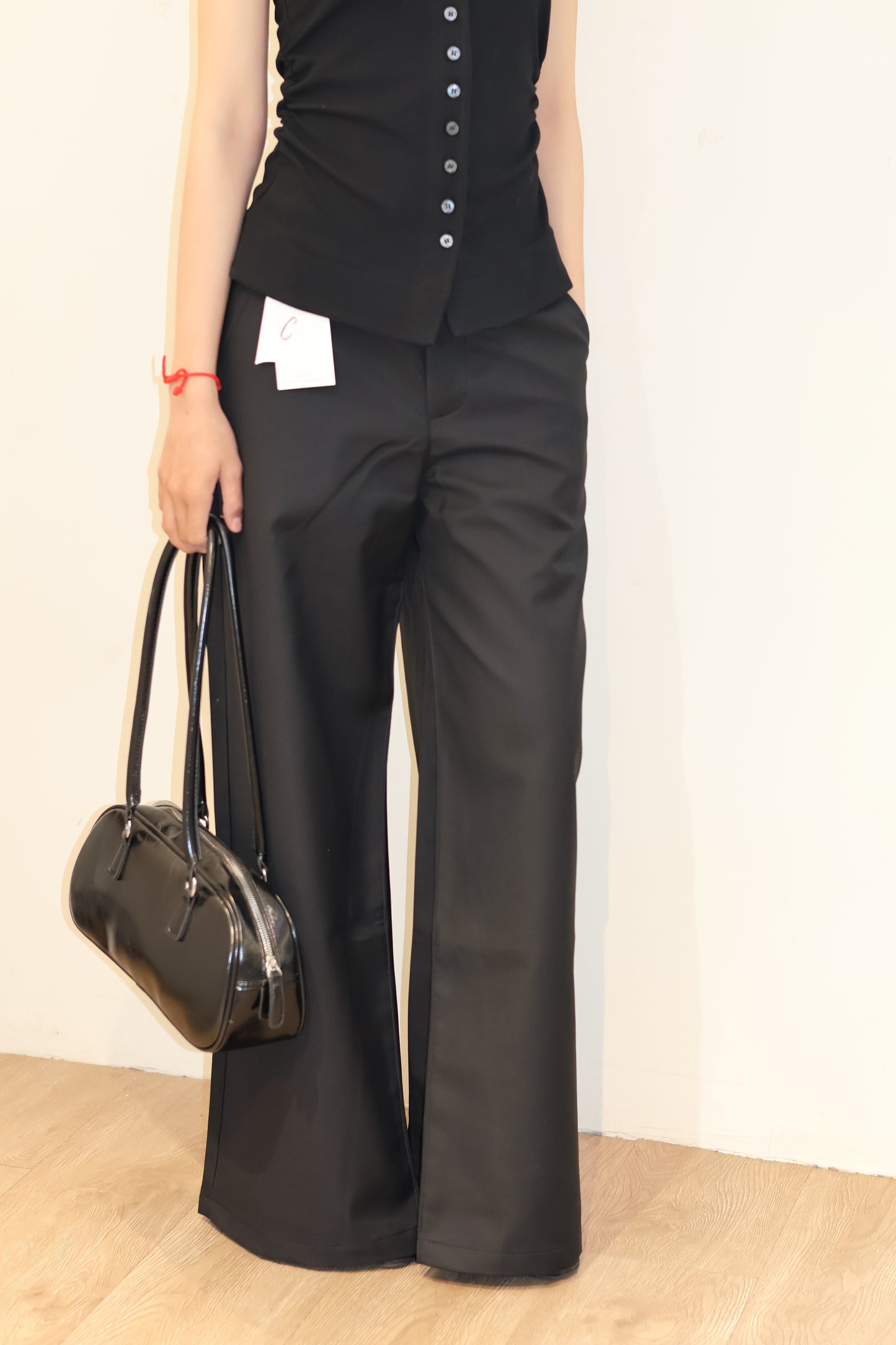 BAGGY BUTTONED TROUSERS