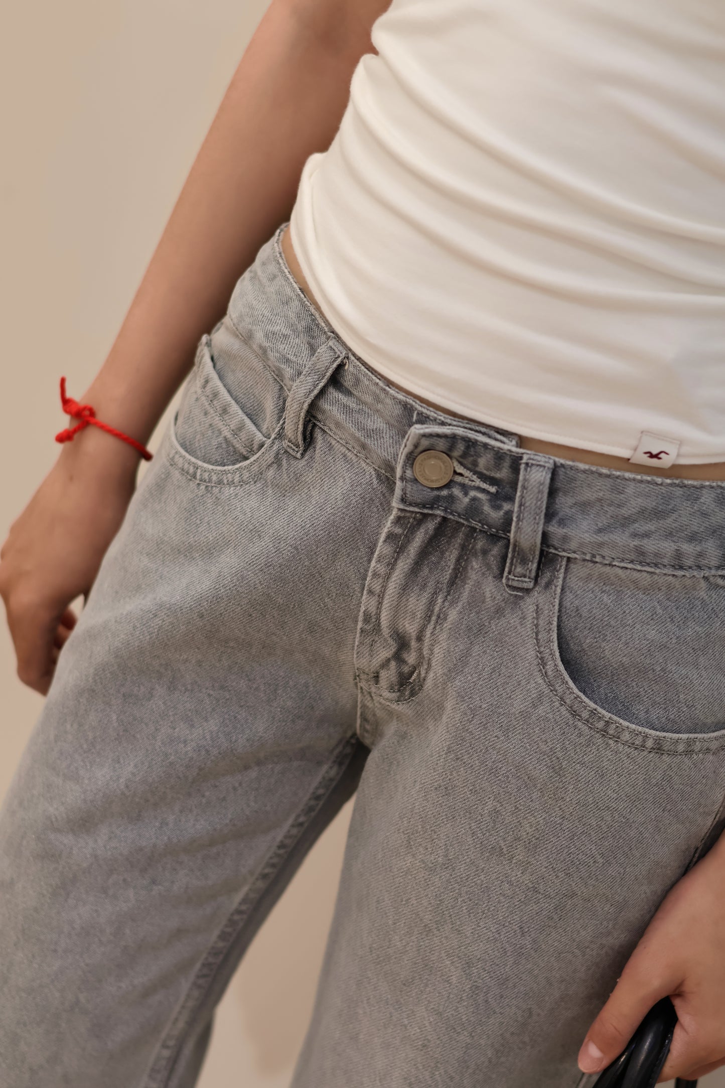 @ GRAY WASHED MID RISE JEANS