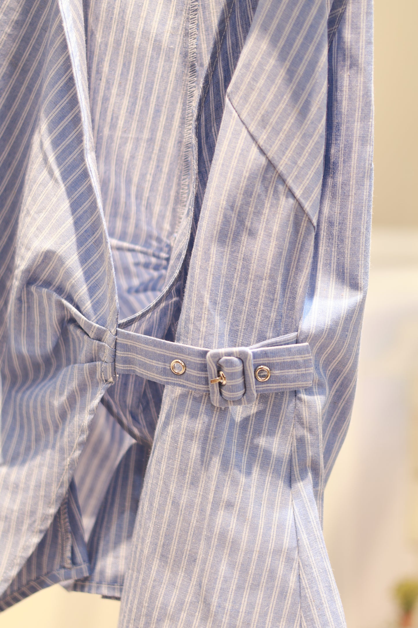 Blue striped buckled halter top