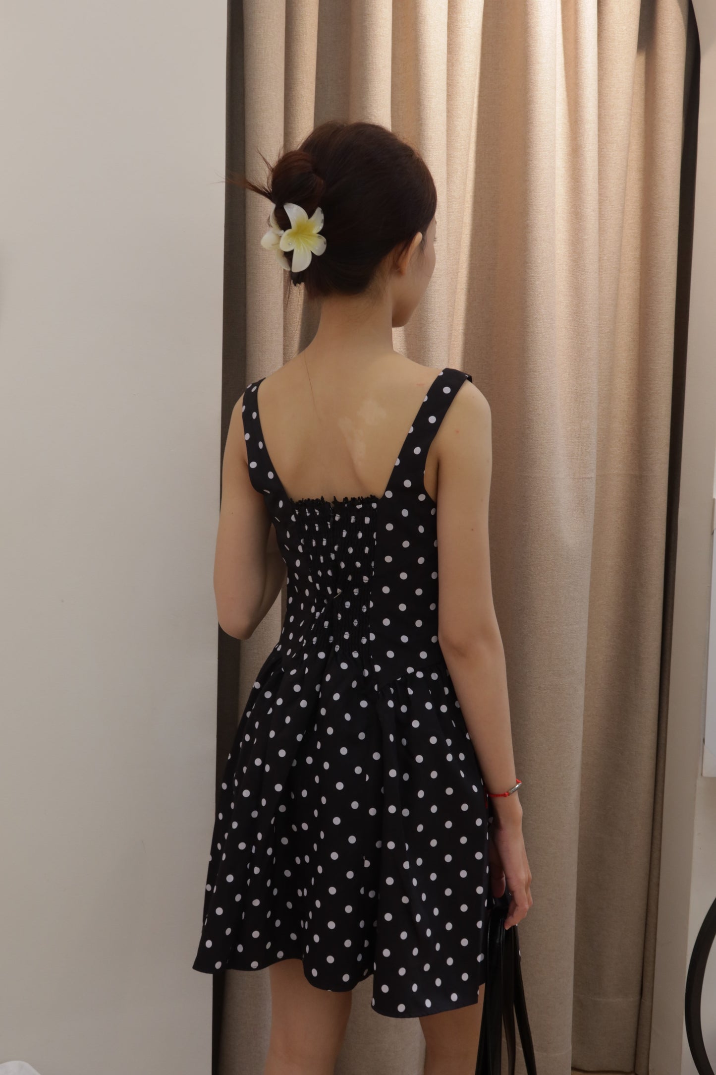 Polka dot black dress