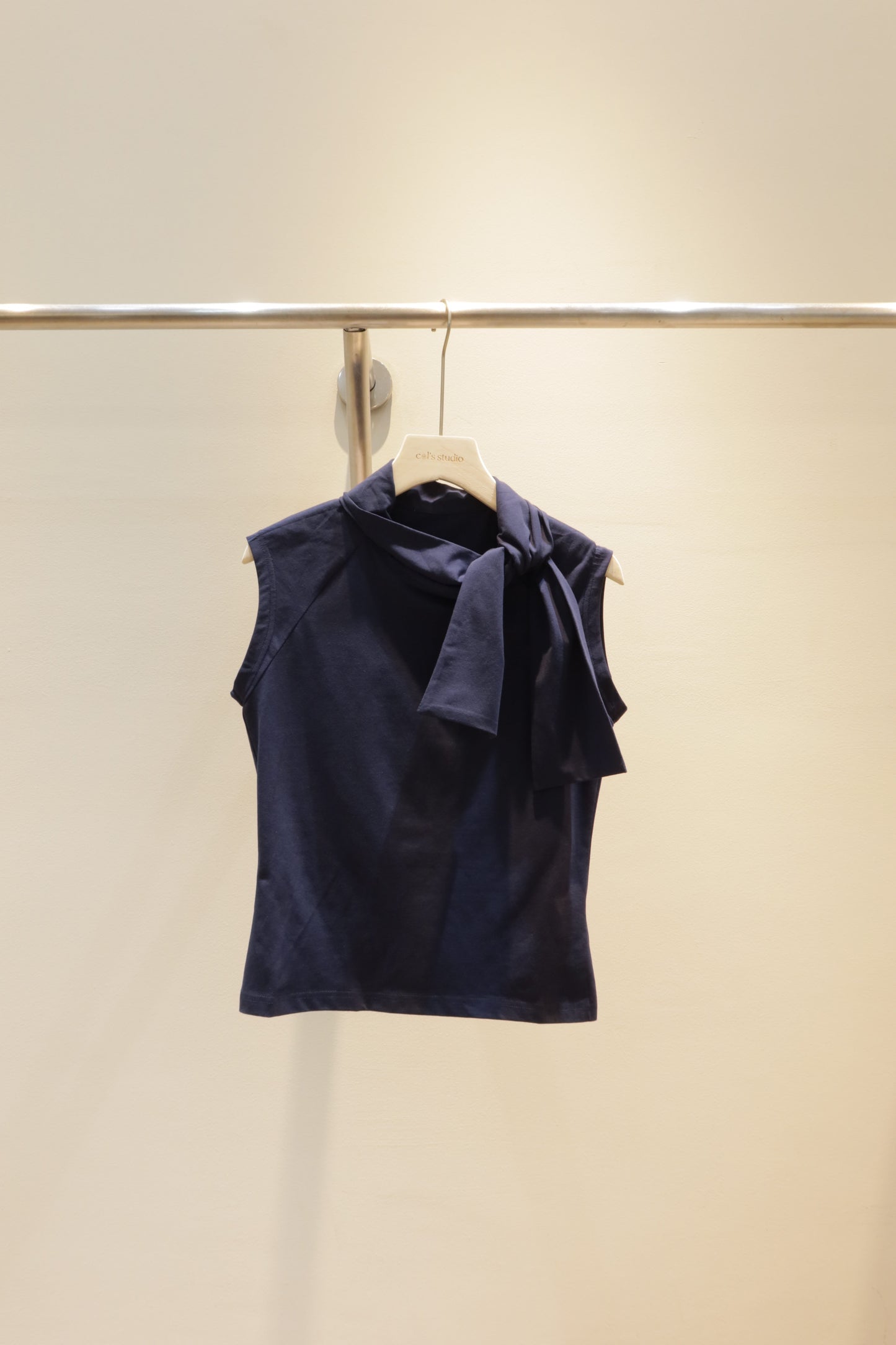 Navy sleeveless bow top