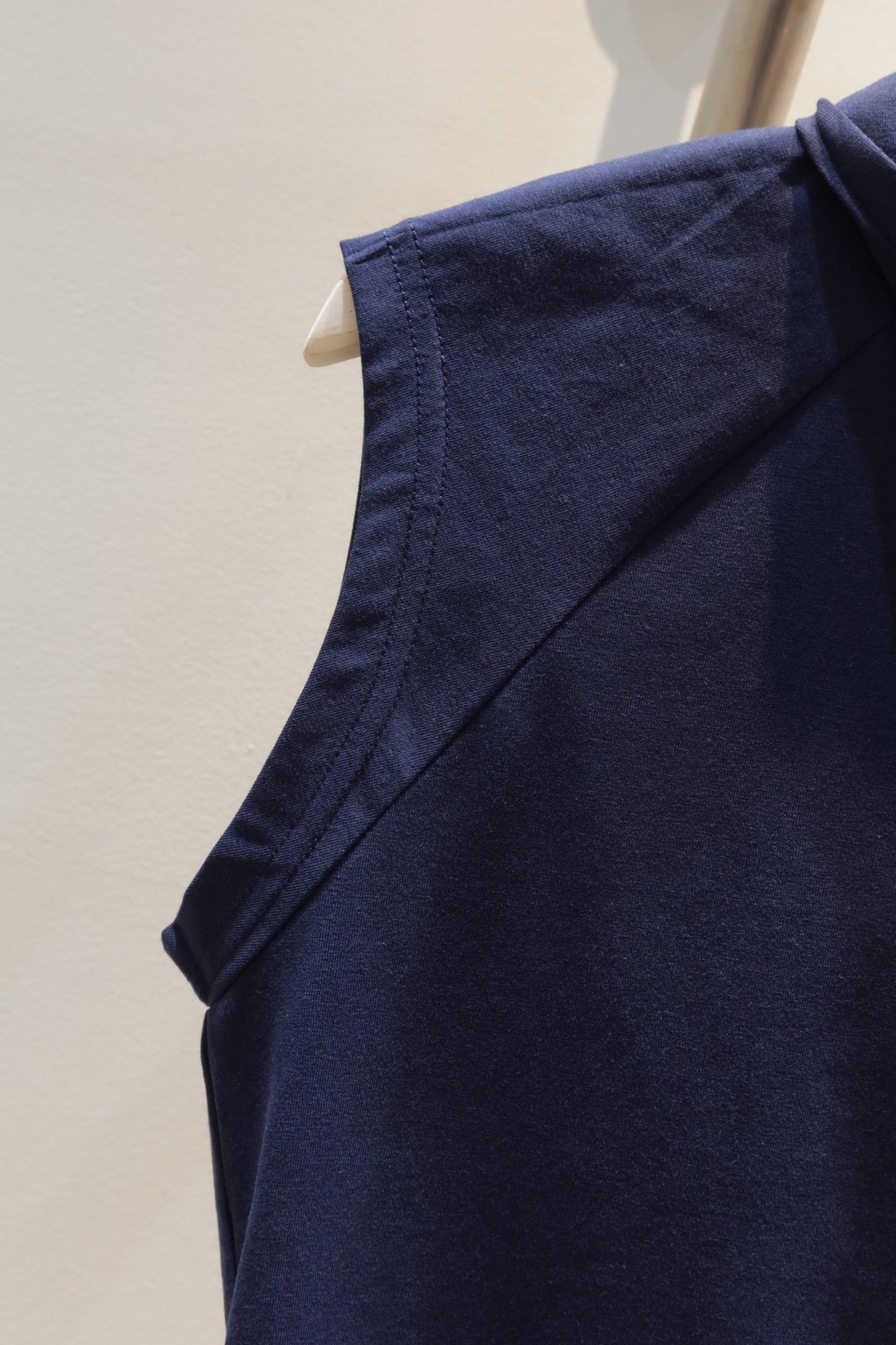 Navy sleeveless bow top