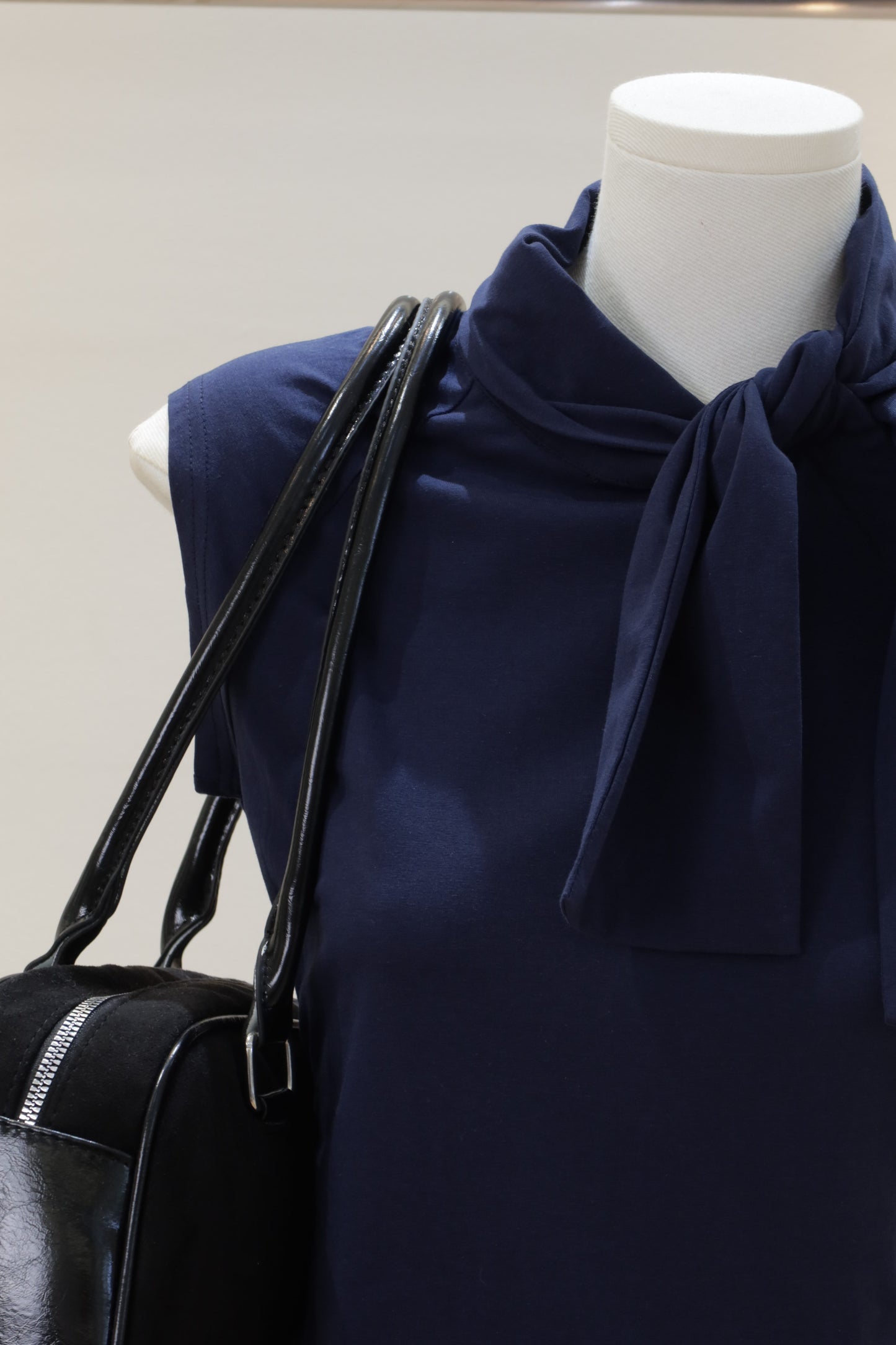 Navy sleeveless bow top