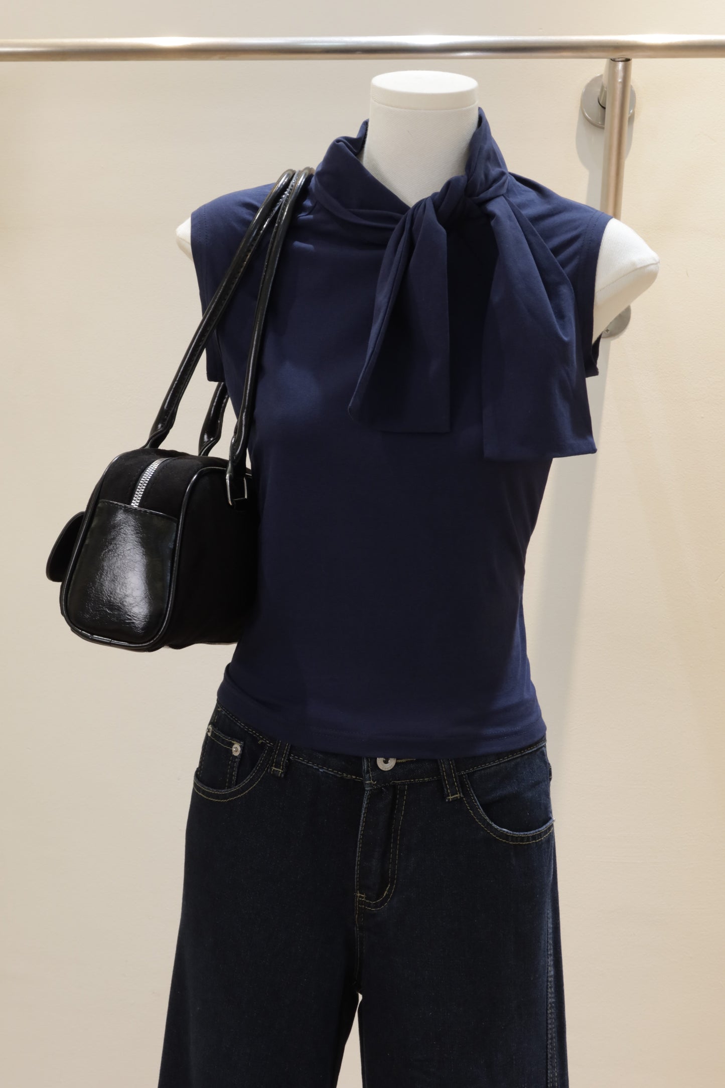 Navy sleeveless bow top