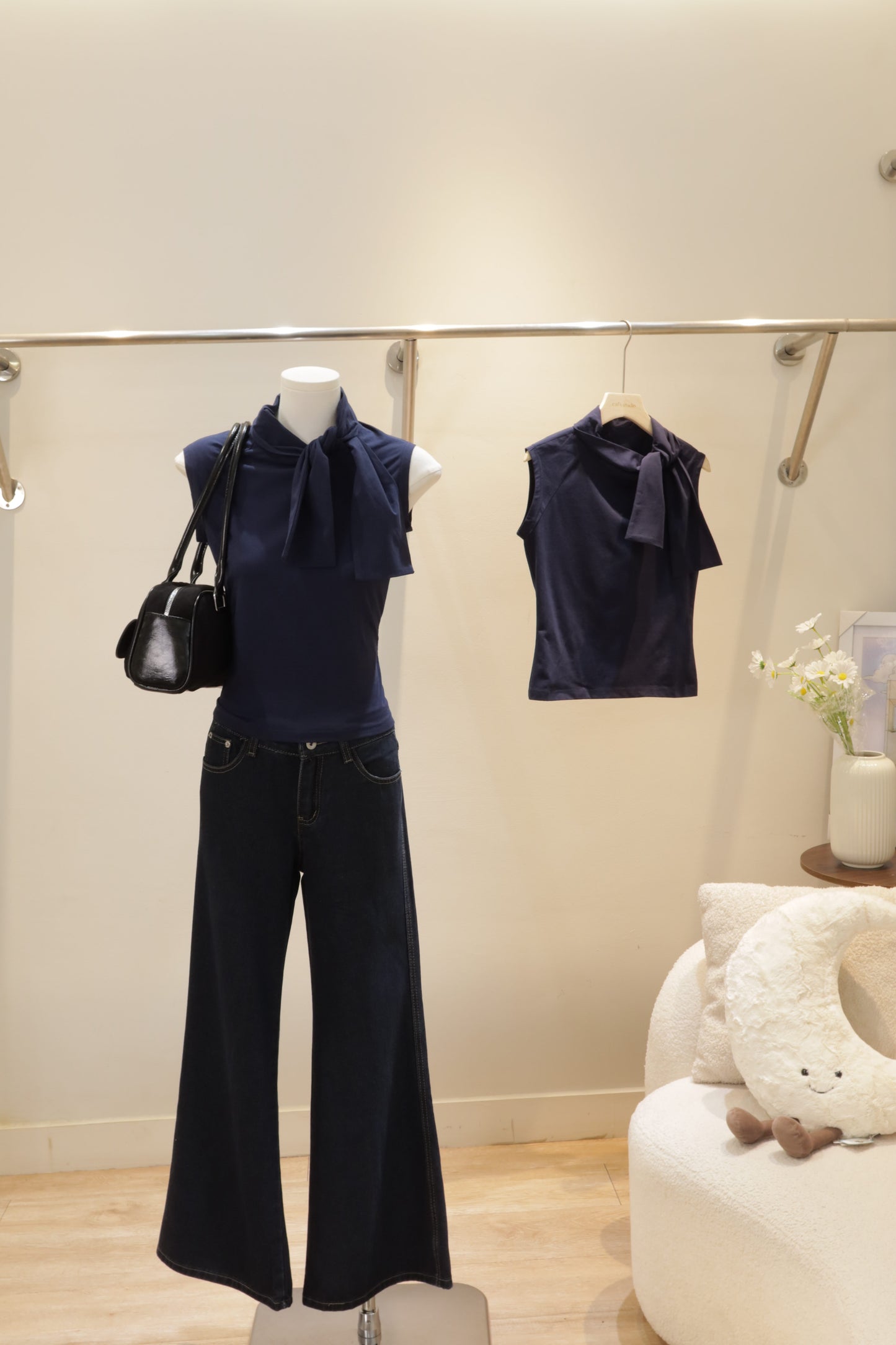 Navy sleeveless bow top