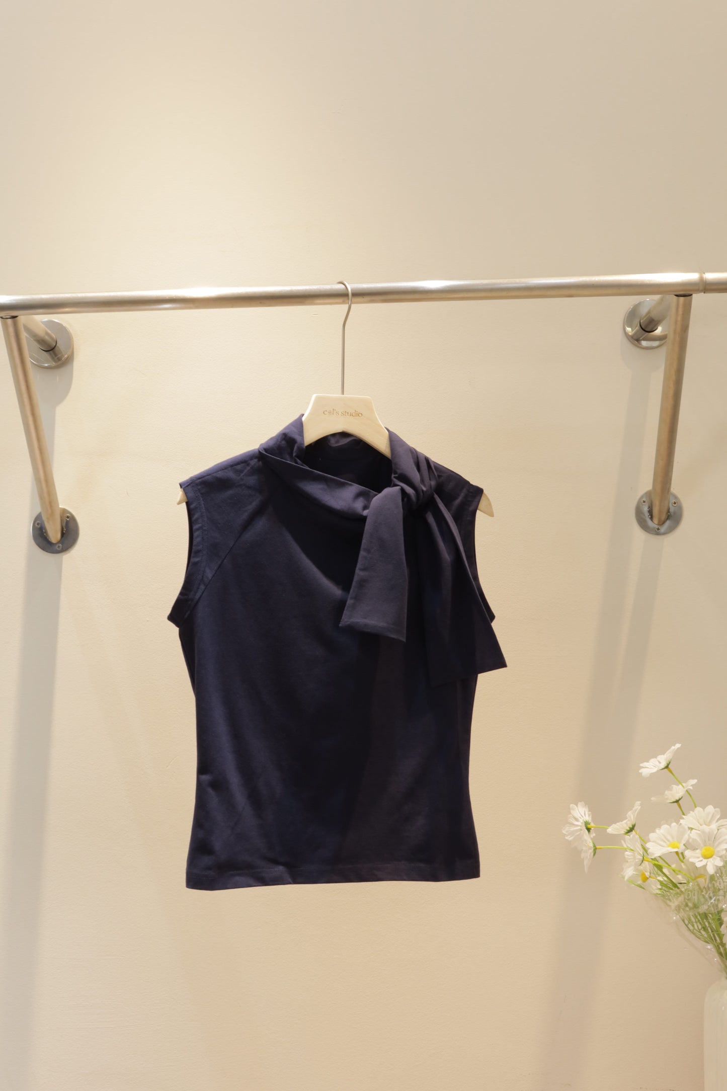 Navy sleeveless bow top