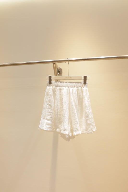White beachy shorts