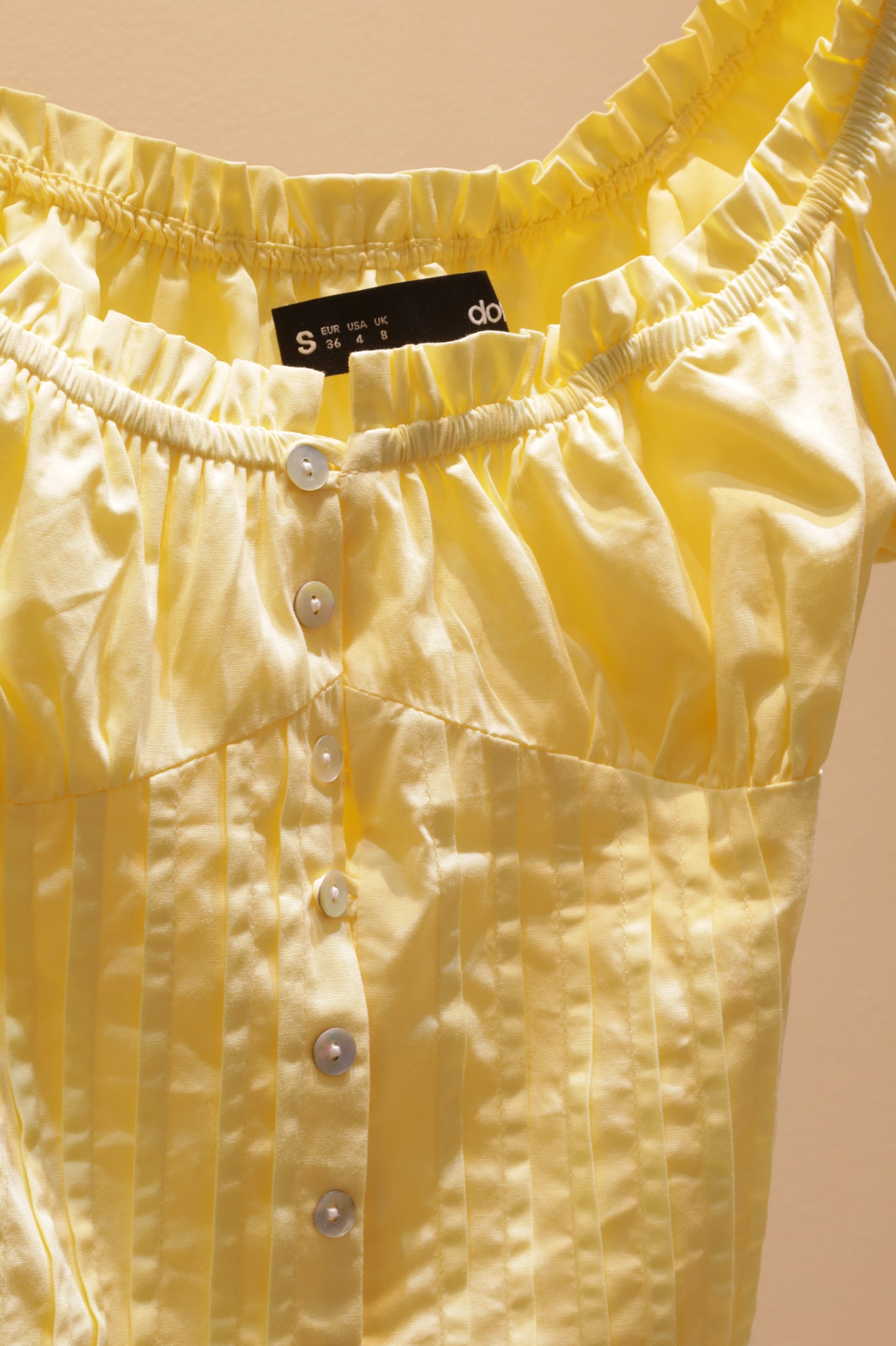 Yellow dottie top