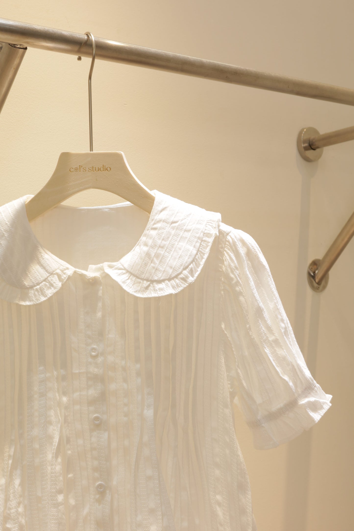 Flowy white babydoll top