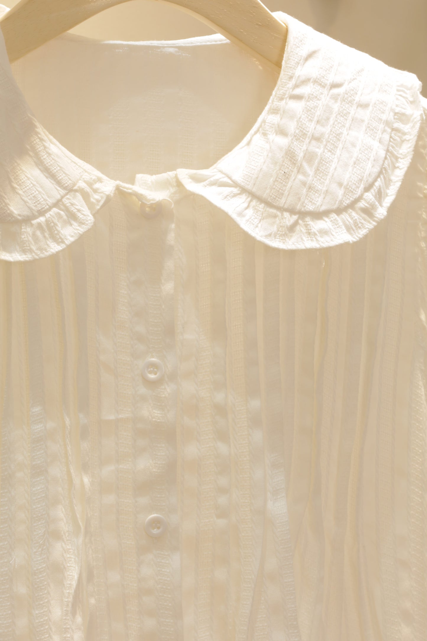 Flowy white babydoll top