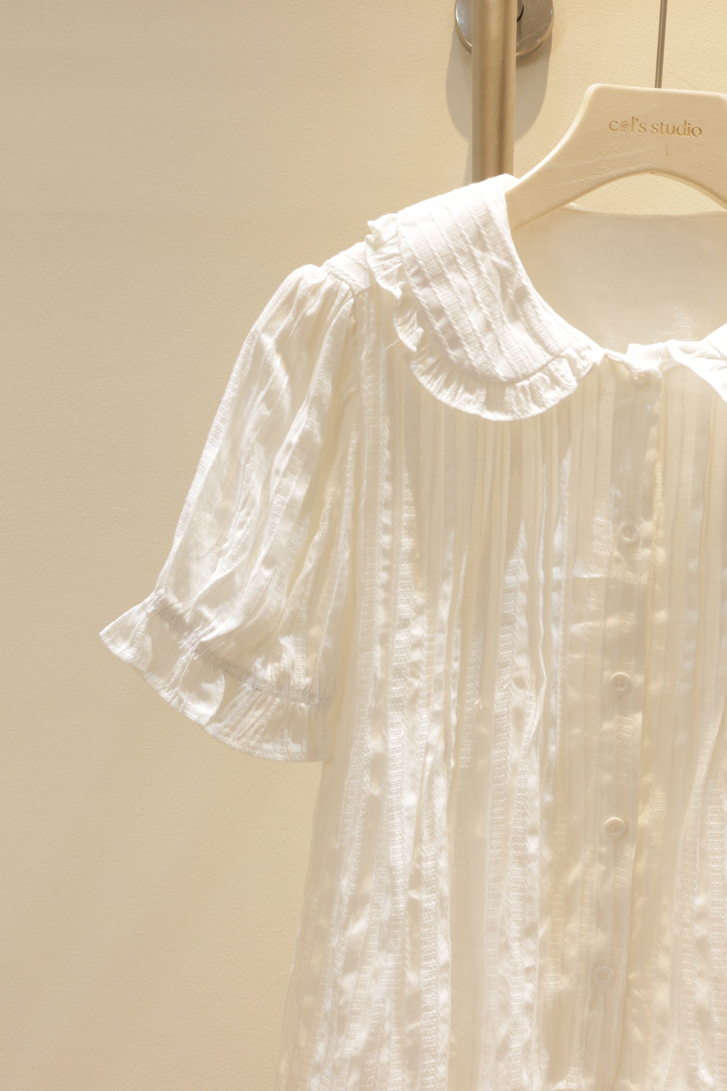 Flowy white babydoll top
