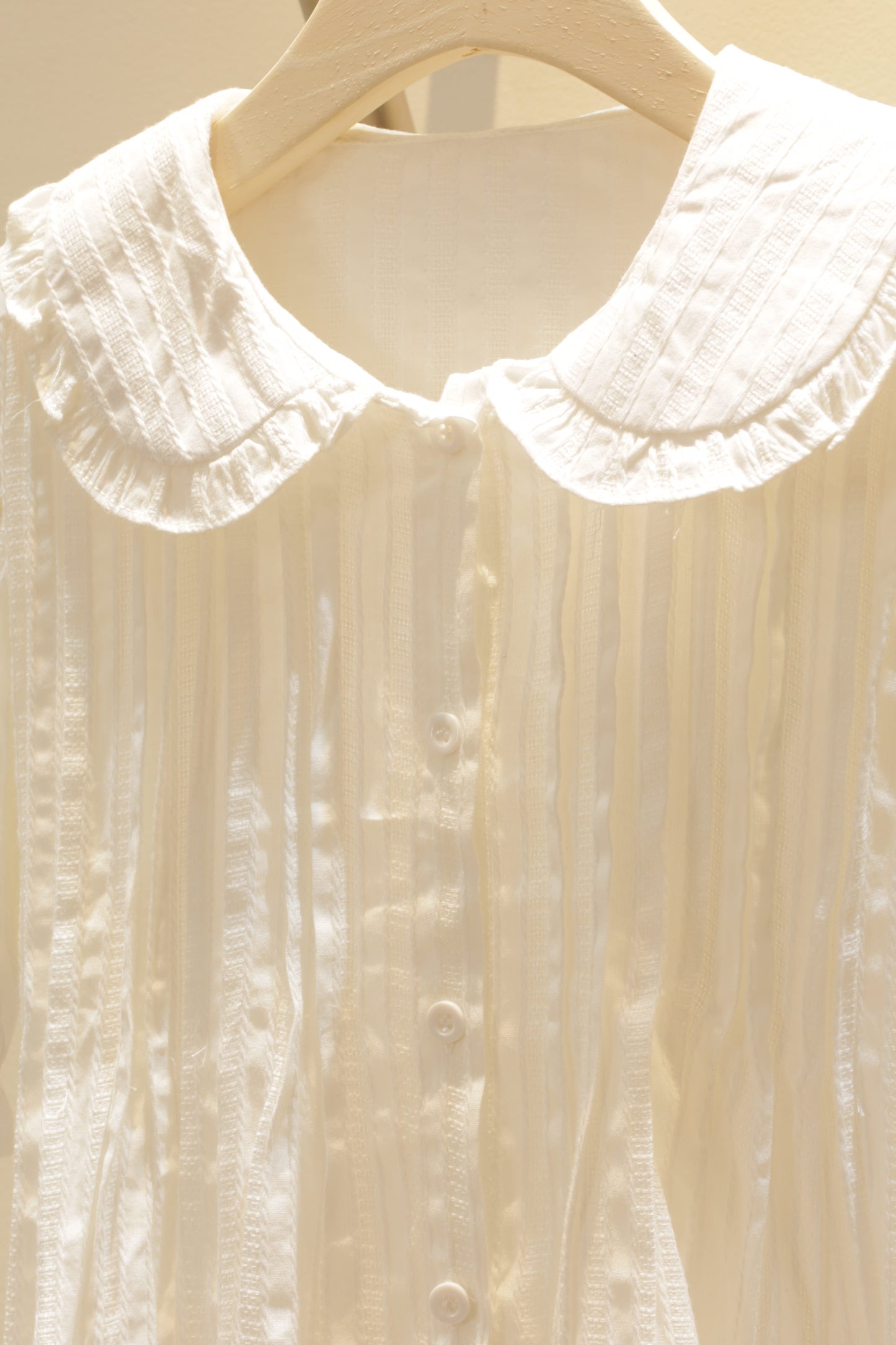 Flowy white babydoll top