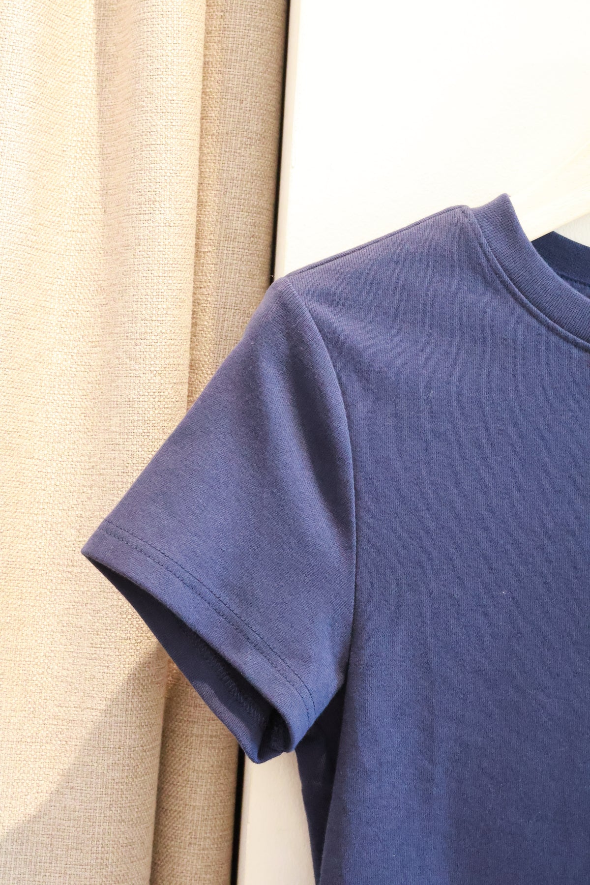 UNIQLO JWA BABY TEE