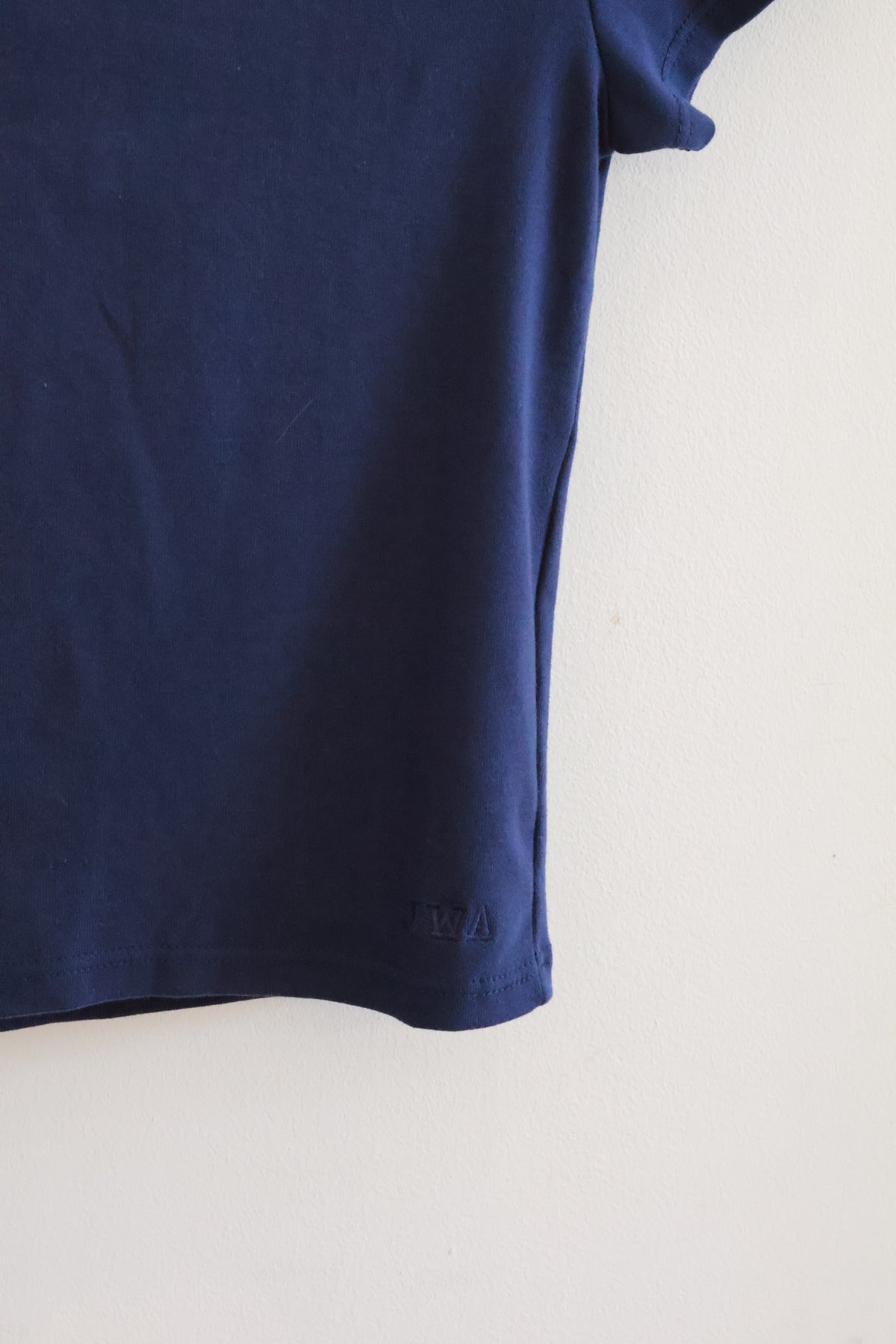 UNIQLO JWA BABY TEE