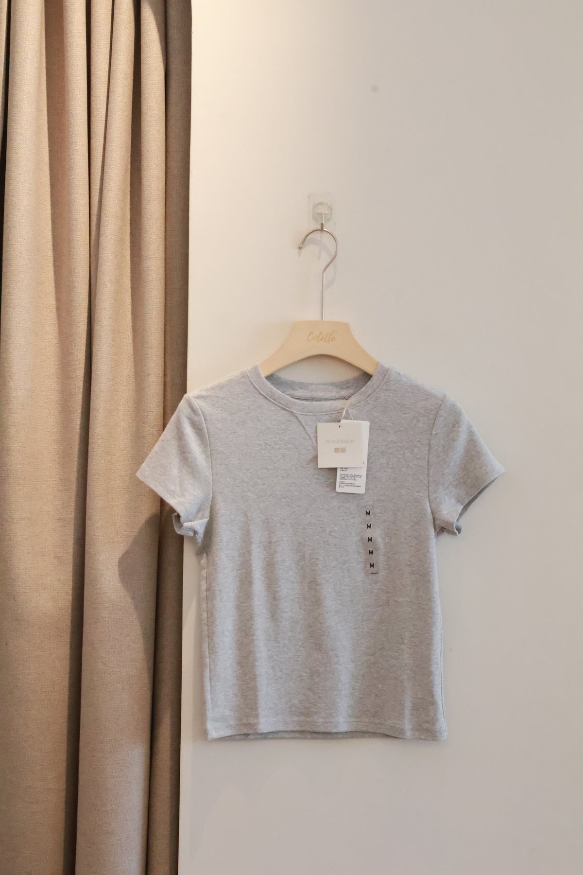 UNIQLO JWA BABY TEE