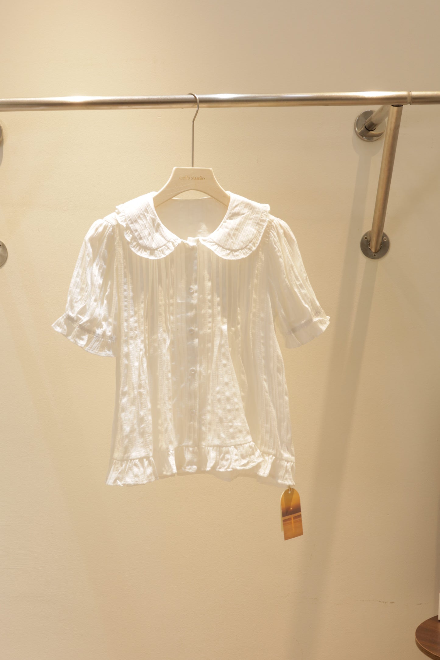 Flowy white babydoll top