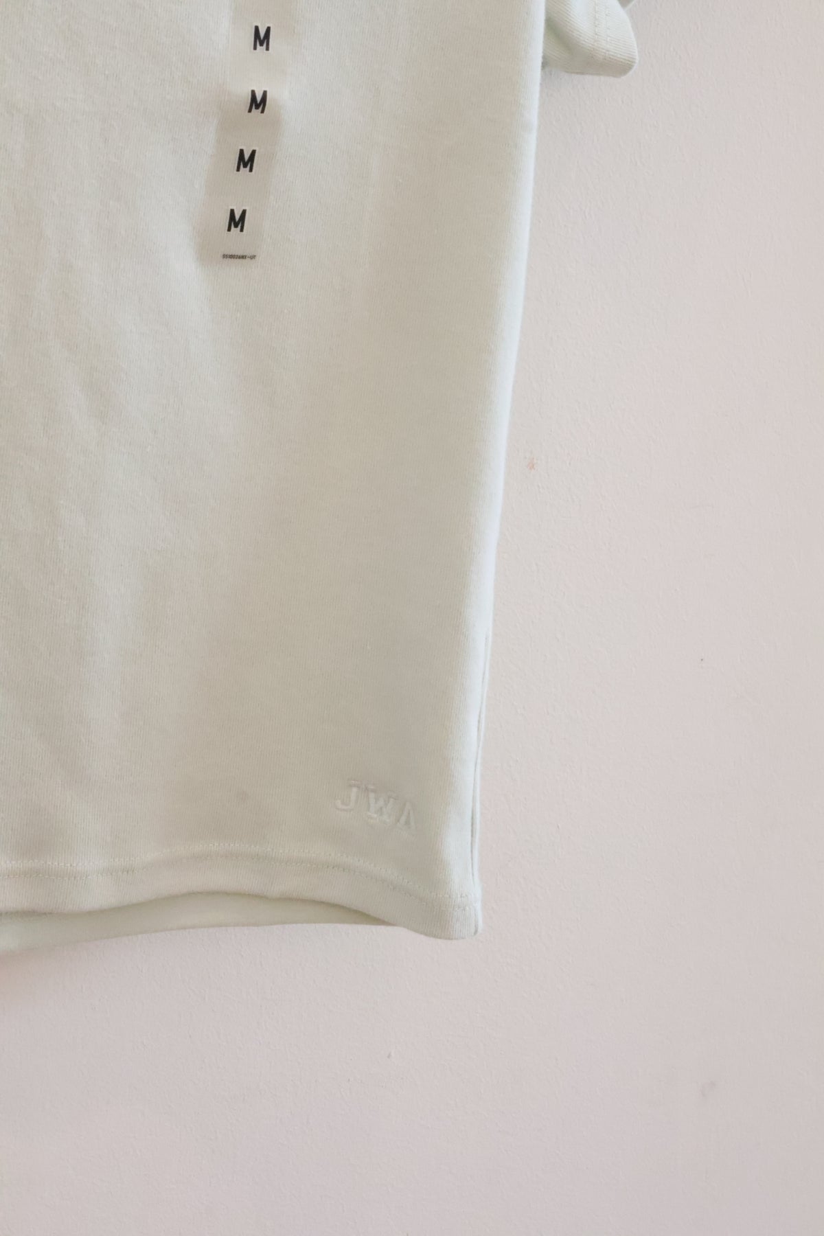UNIQLO JWA BABY TEE