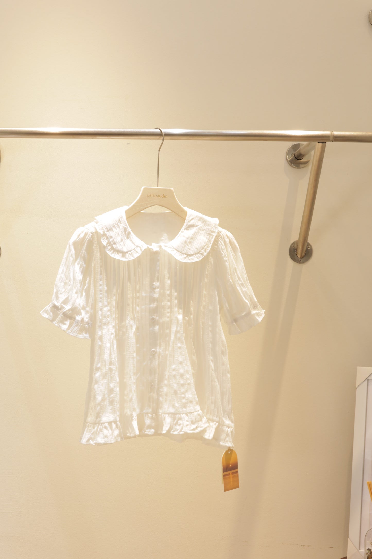 Flowy white babydoll top