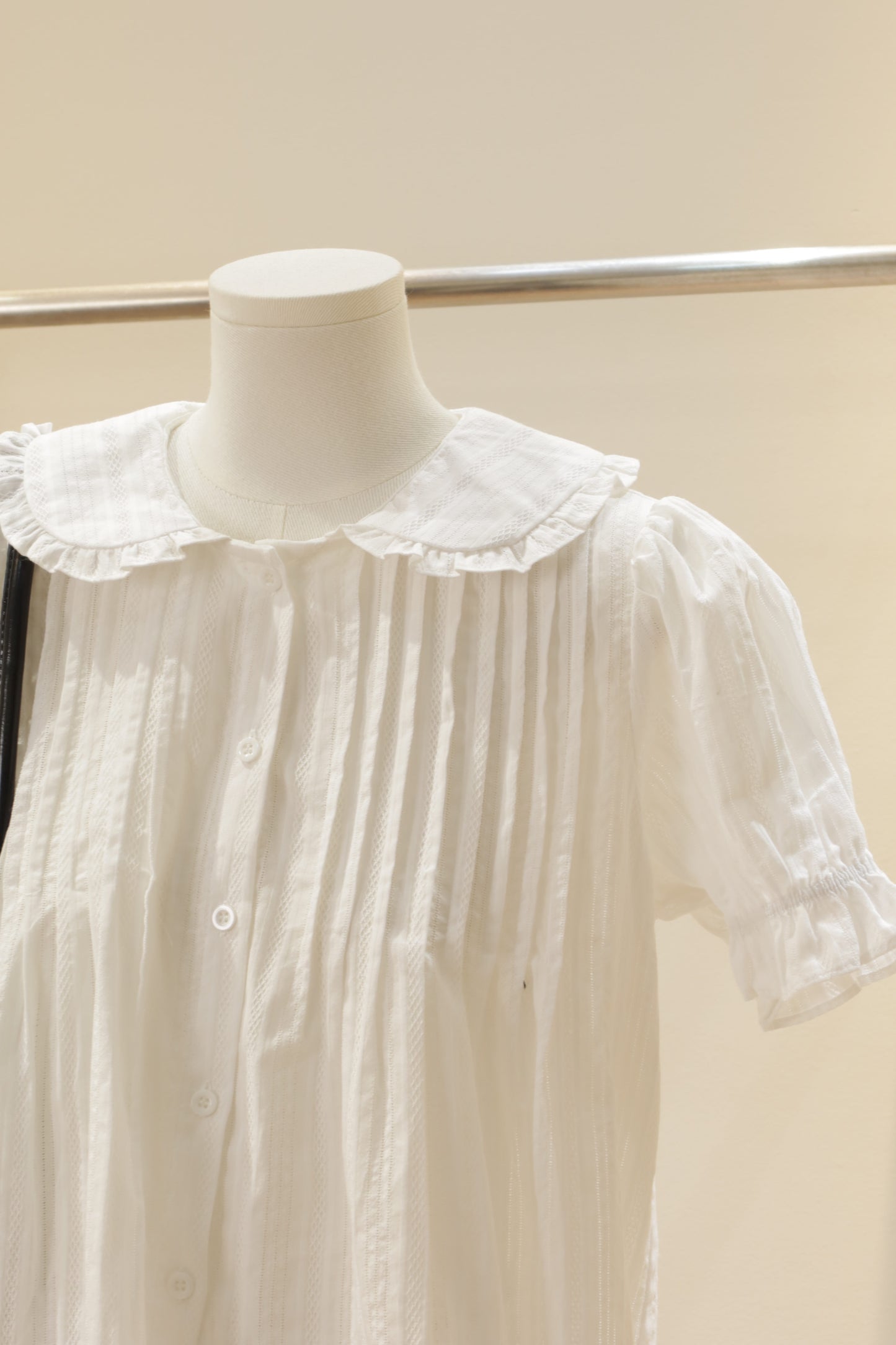 Flowy white babydoll top