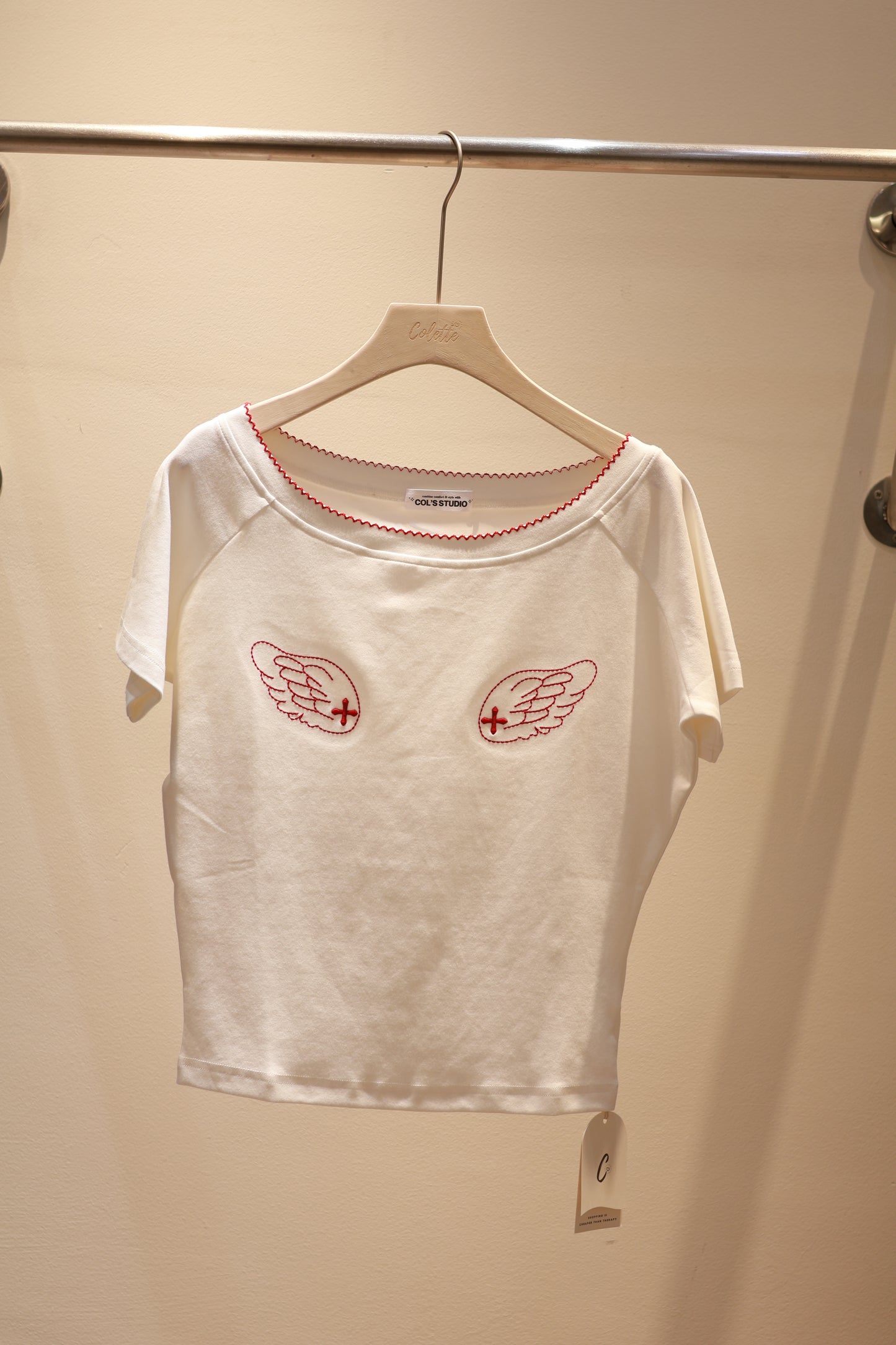 ANGEL GRAPHIC HALF SHOULDER TOP