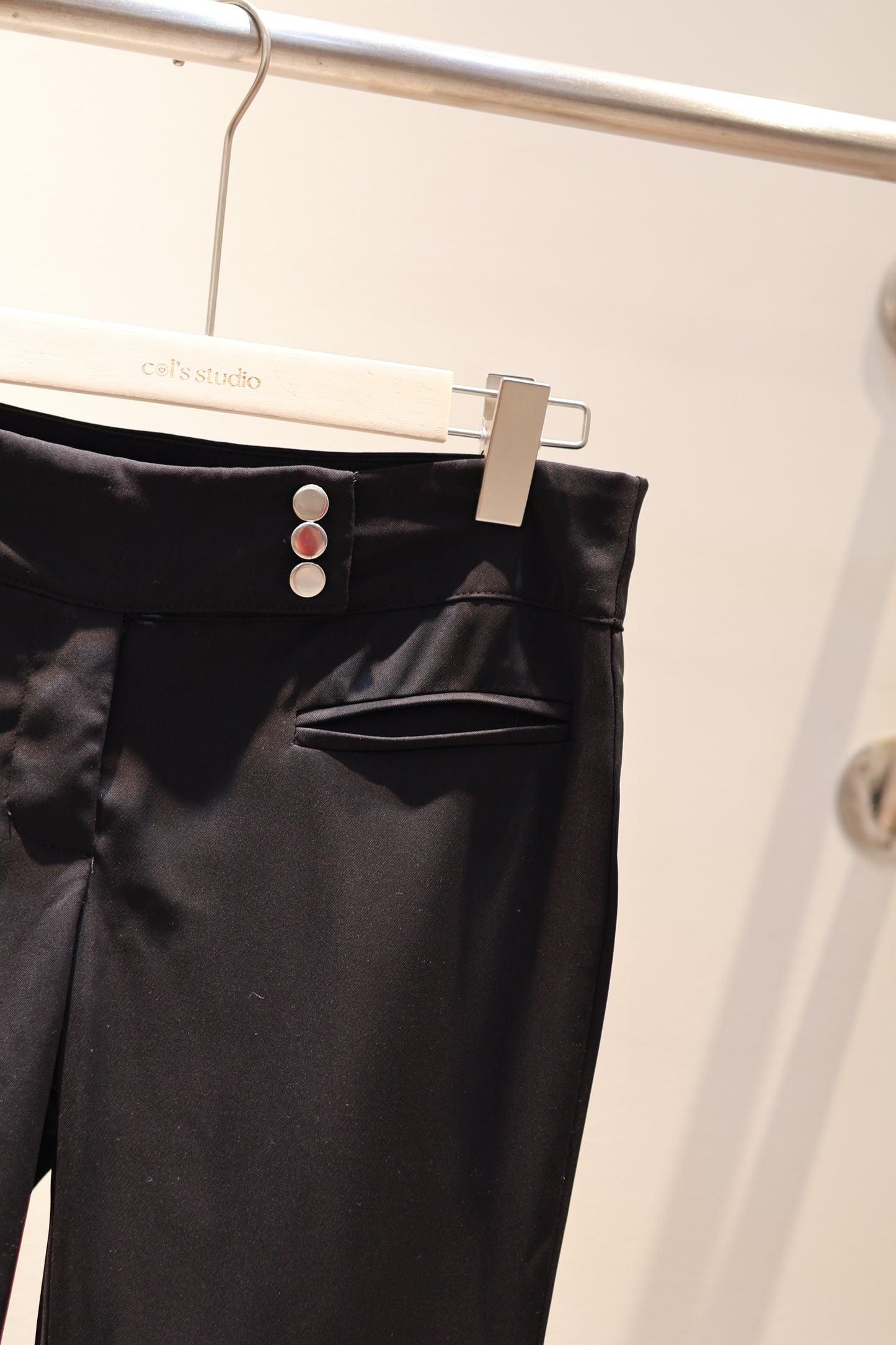 SIDE BUTTONS FLARED TROUSERS