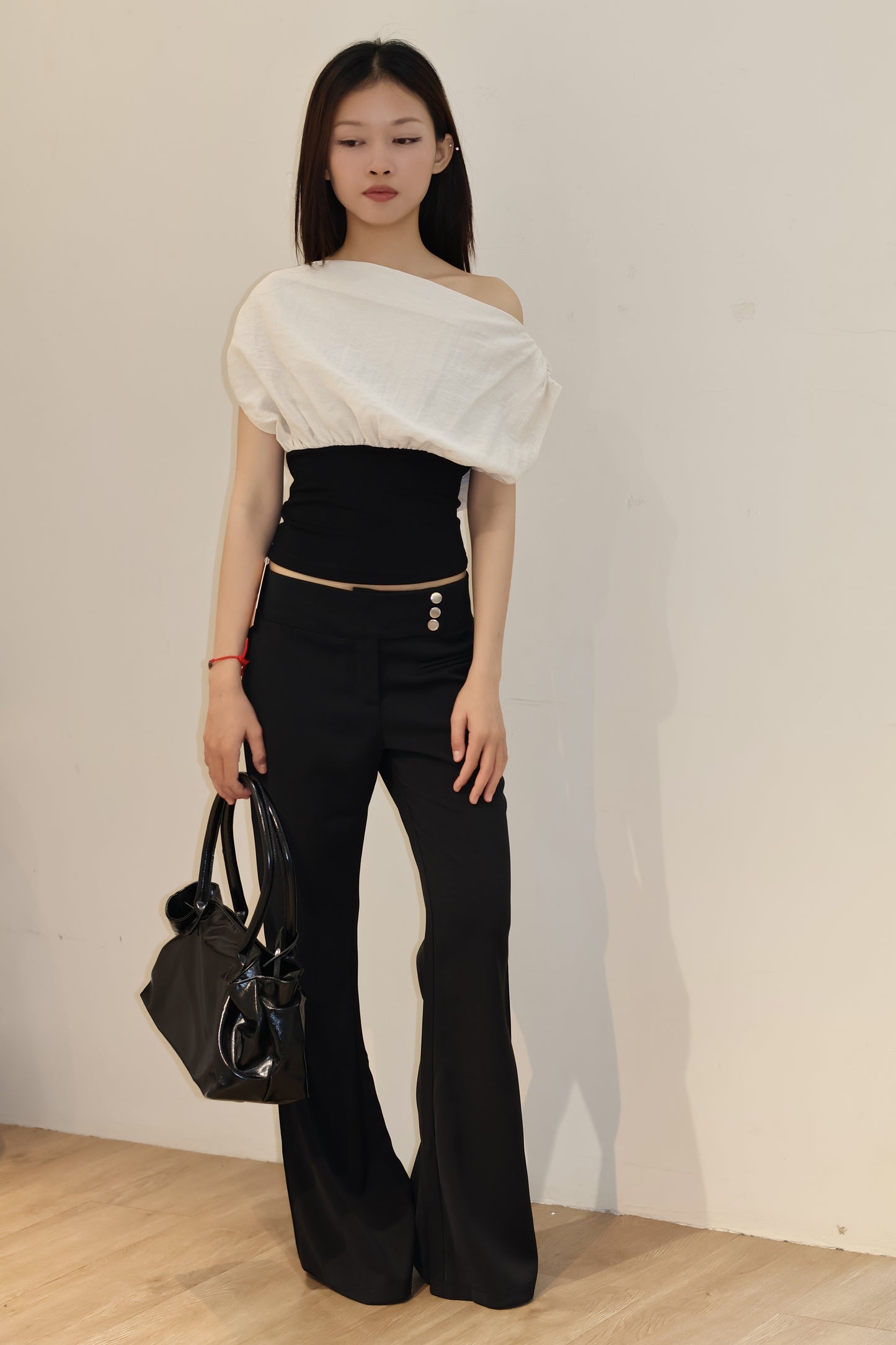 SIDE BUTTONS FLARED TROUSERS