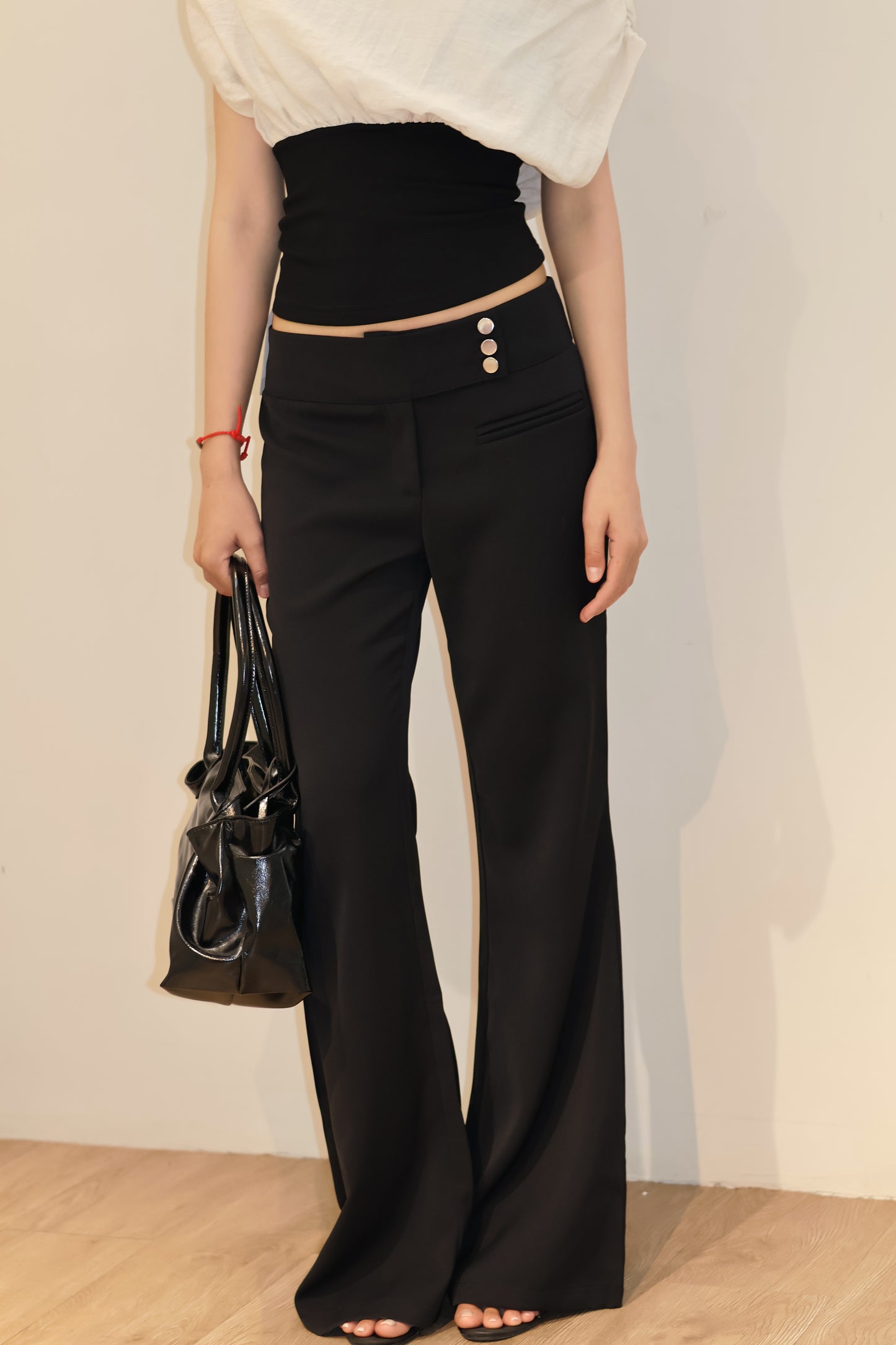 SIDE BUTTONS FLARED TROUSERS