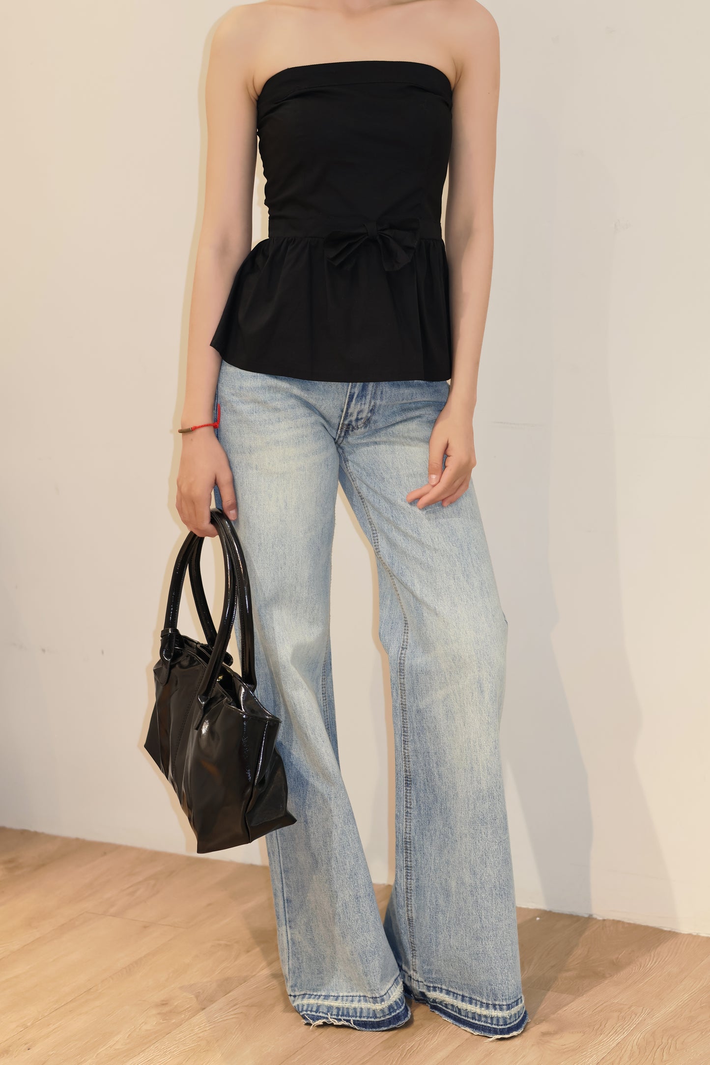 BLACK FRONT RIBBON TUBE FLOWY TOP