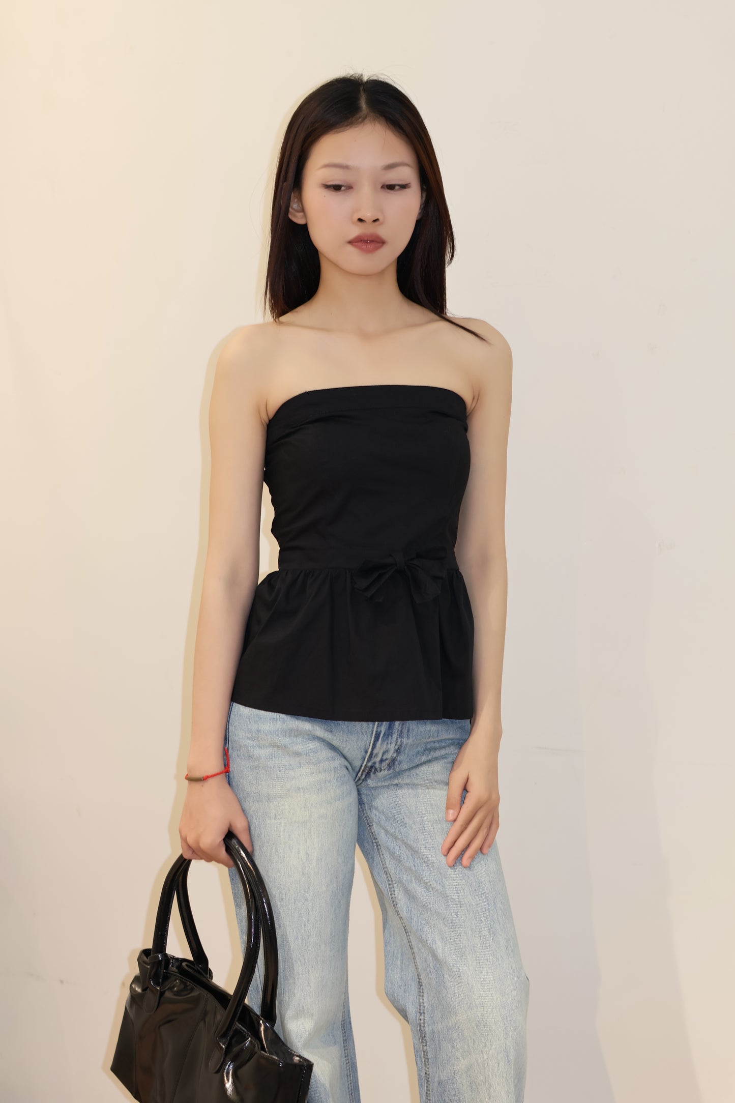 BLACK FRONT RIBBON TUBE FLOWY TOP