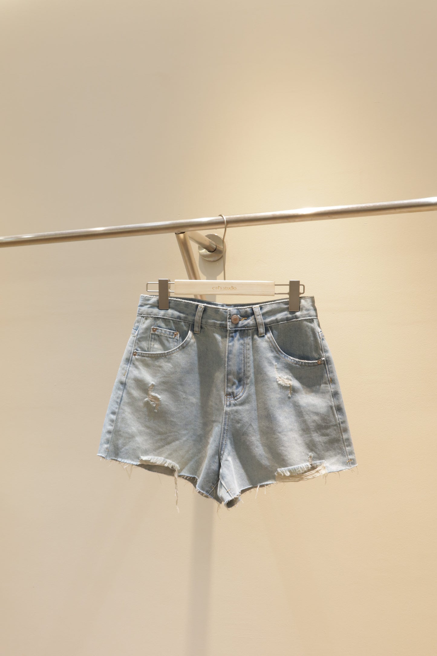 J3 distressed denim shorts