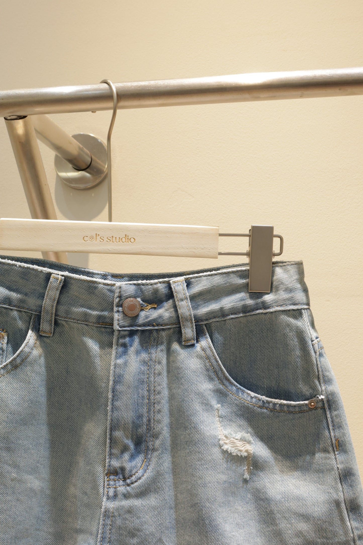 J3 distressed denim shorts
