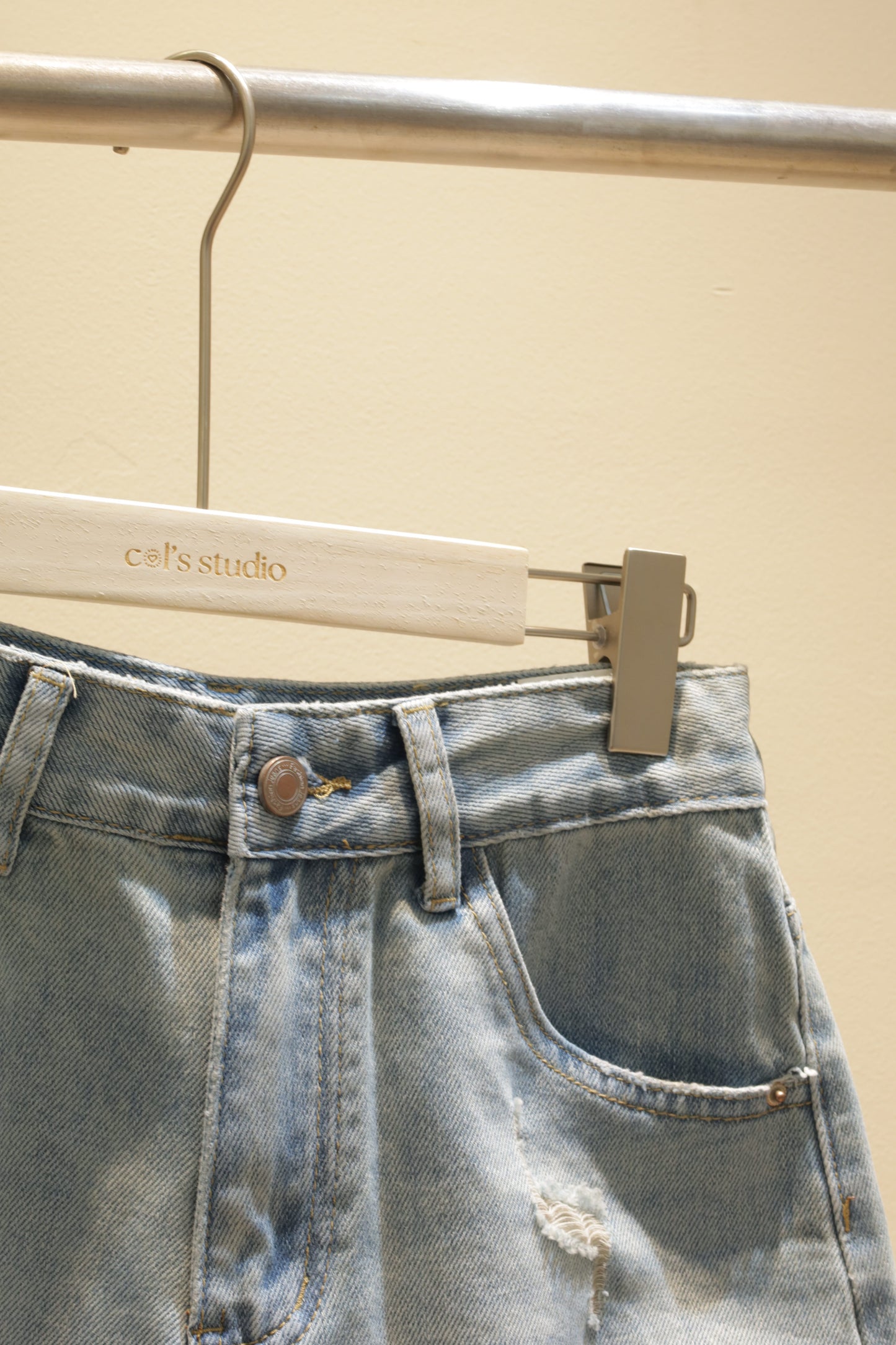 J3 distressed denim shorts