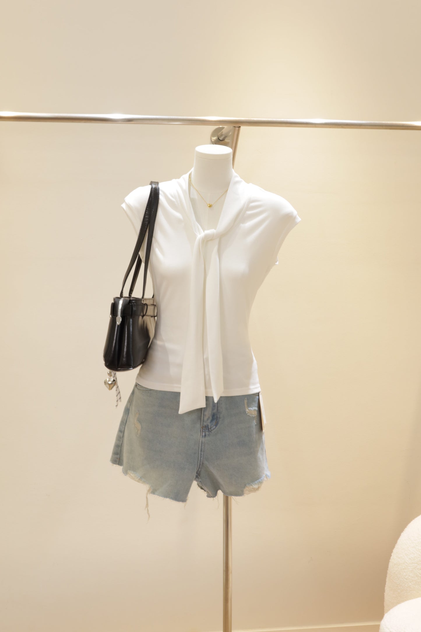 J3 distressed denim shorts