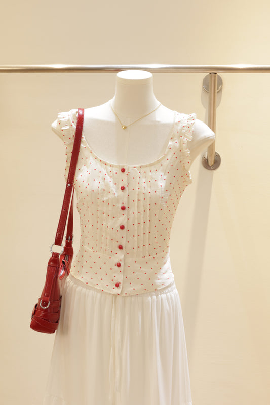 Red polkadot buttons top