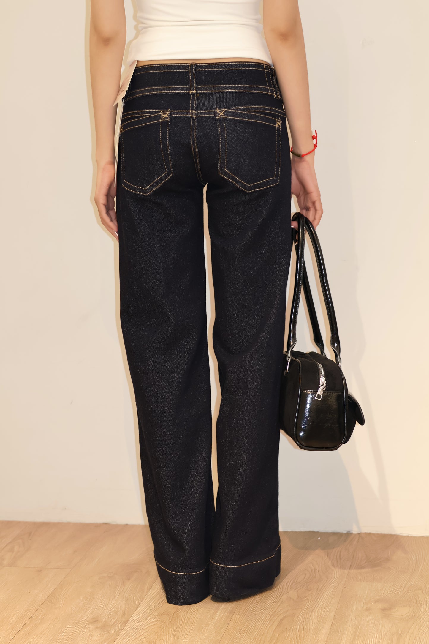 Double buttoned flared denim jeans