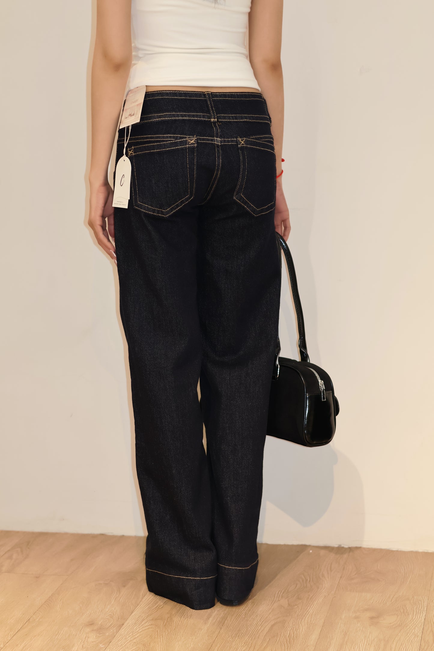 Double buttoned flared denim jeans
