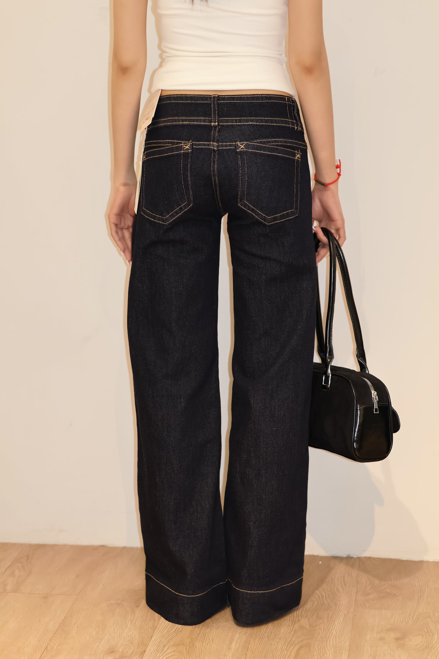 Double buttoned flared denim jeans